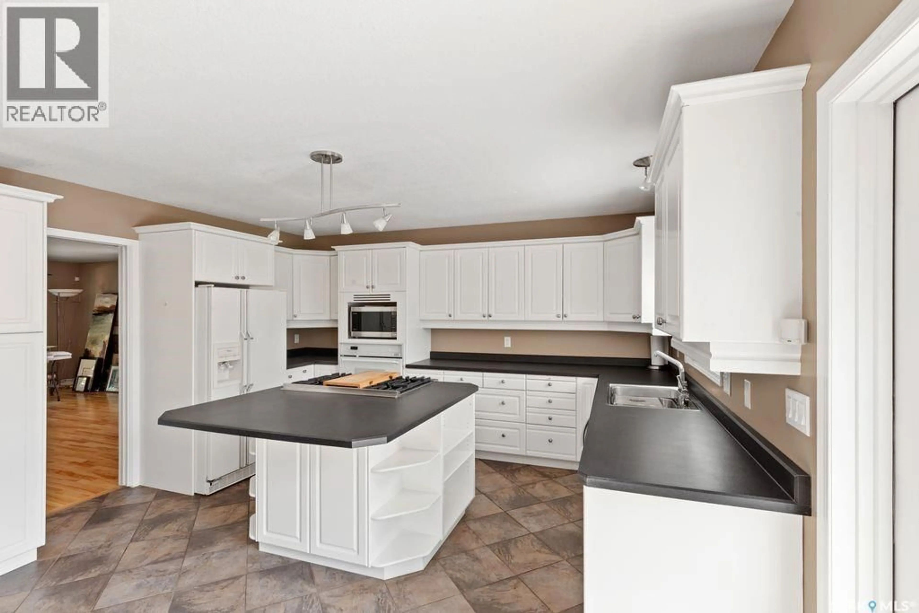 Open concept kitchen, ceramic/tile floor for 1036 OSLER STREET, Saskatoon Saskatchewan S7N0T4