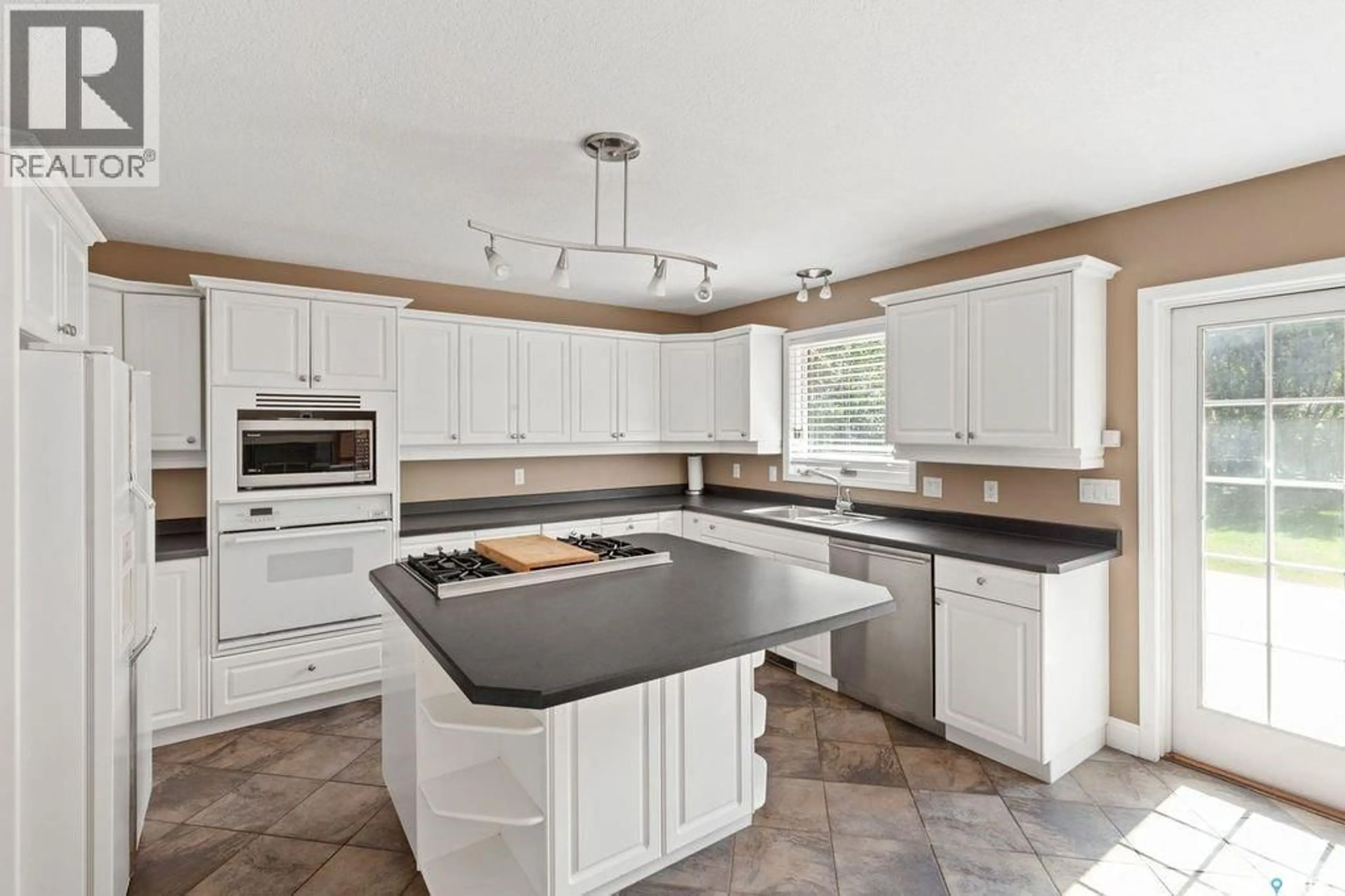 Open concept kitchen, ceramic/tile floor for 1036 OSLER STREET, Saskatoon Saskatchewan S7N0T4