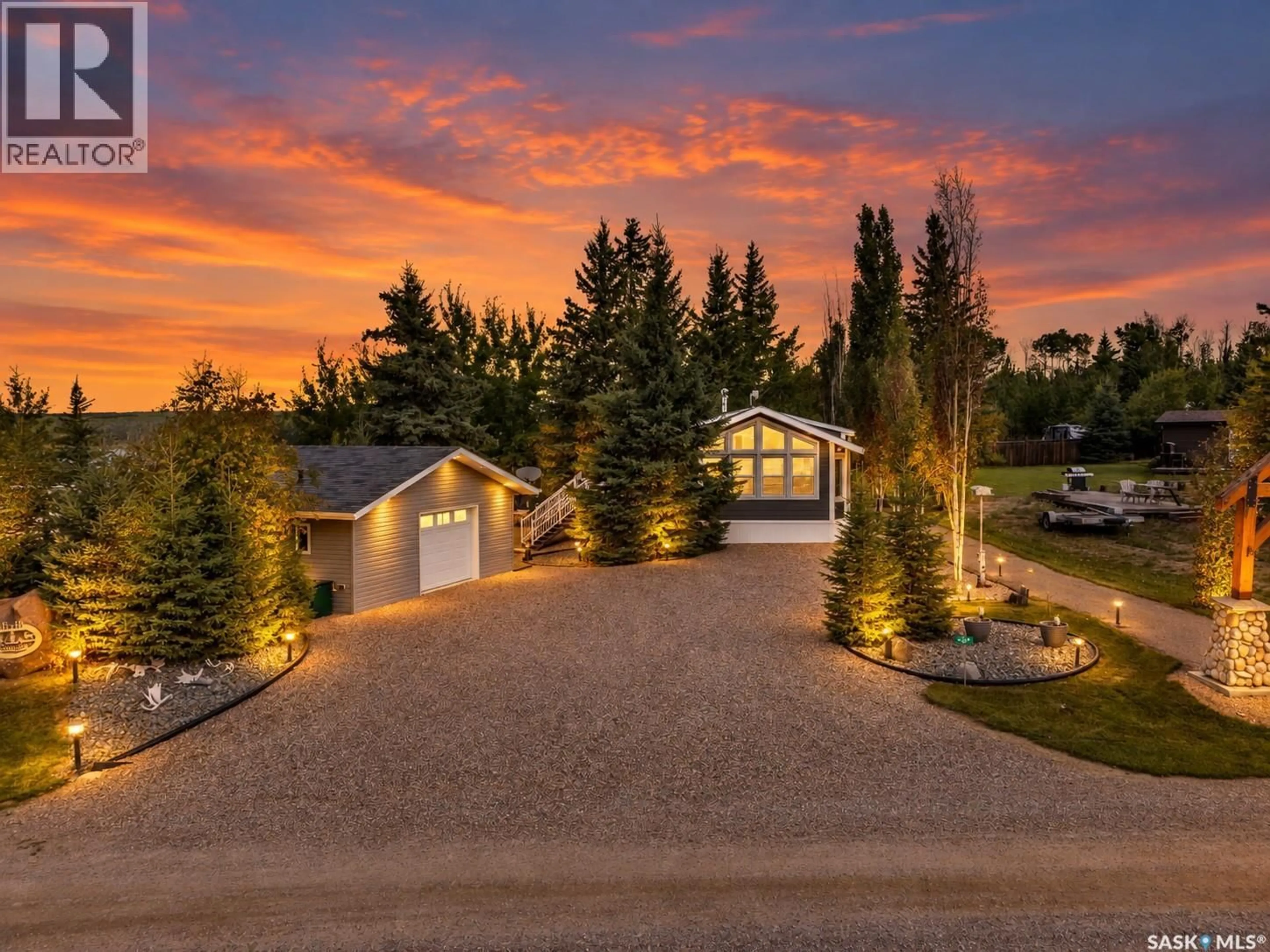A pic from outside/outdoor area/front of a property/back of a property/a pic from drone, unknown for 404 ASH AVENUE, Lac des Îles Saskatchewan S0M1A0