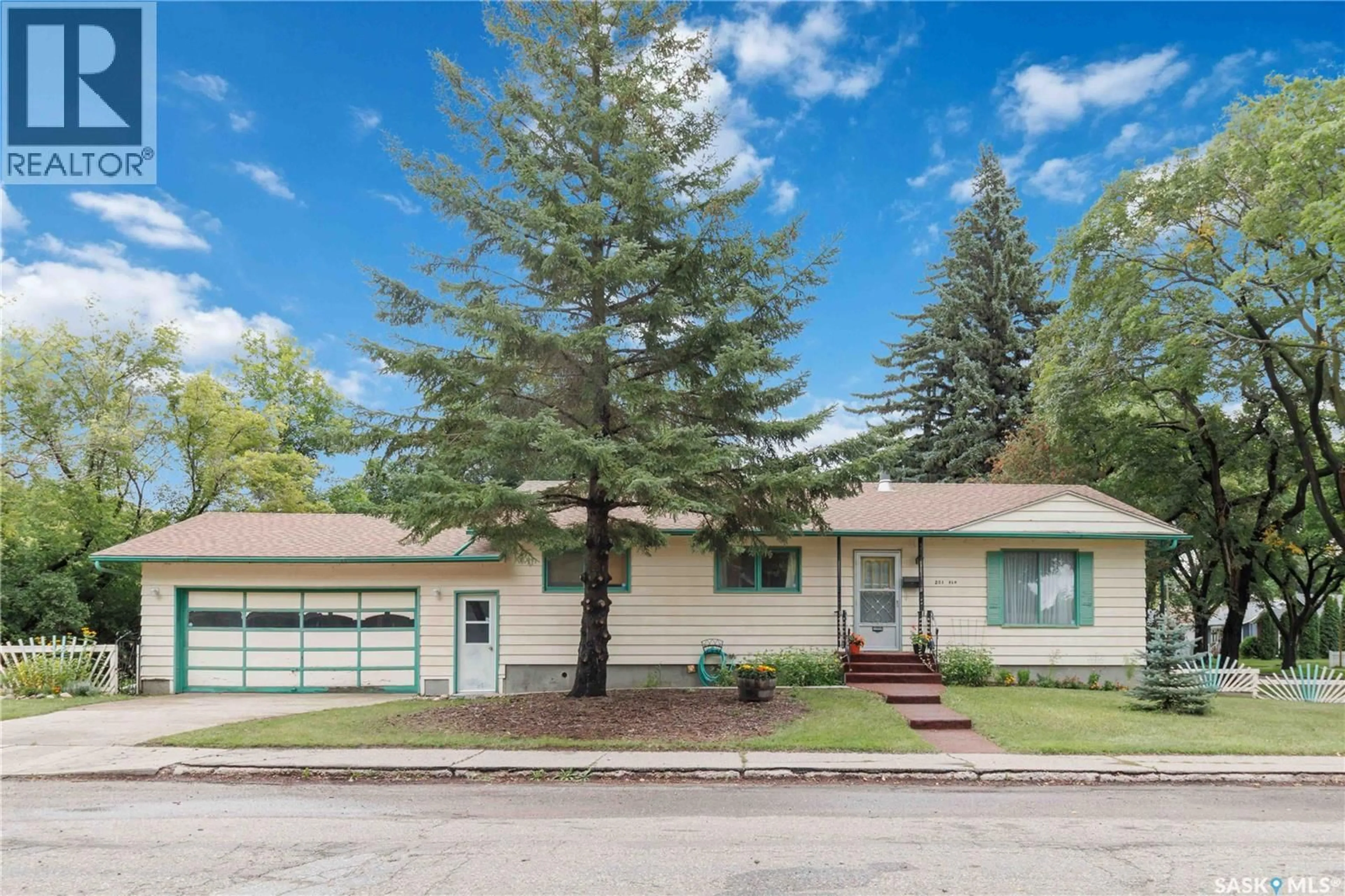 Home with vinyl exterior material, street for 201 ELM STREET, Saskatoon Saskatchewan S7J0G8