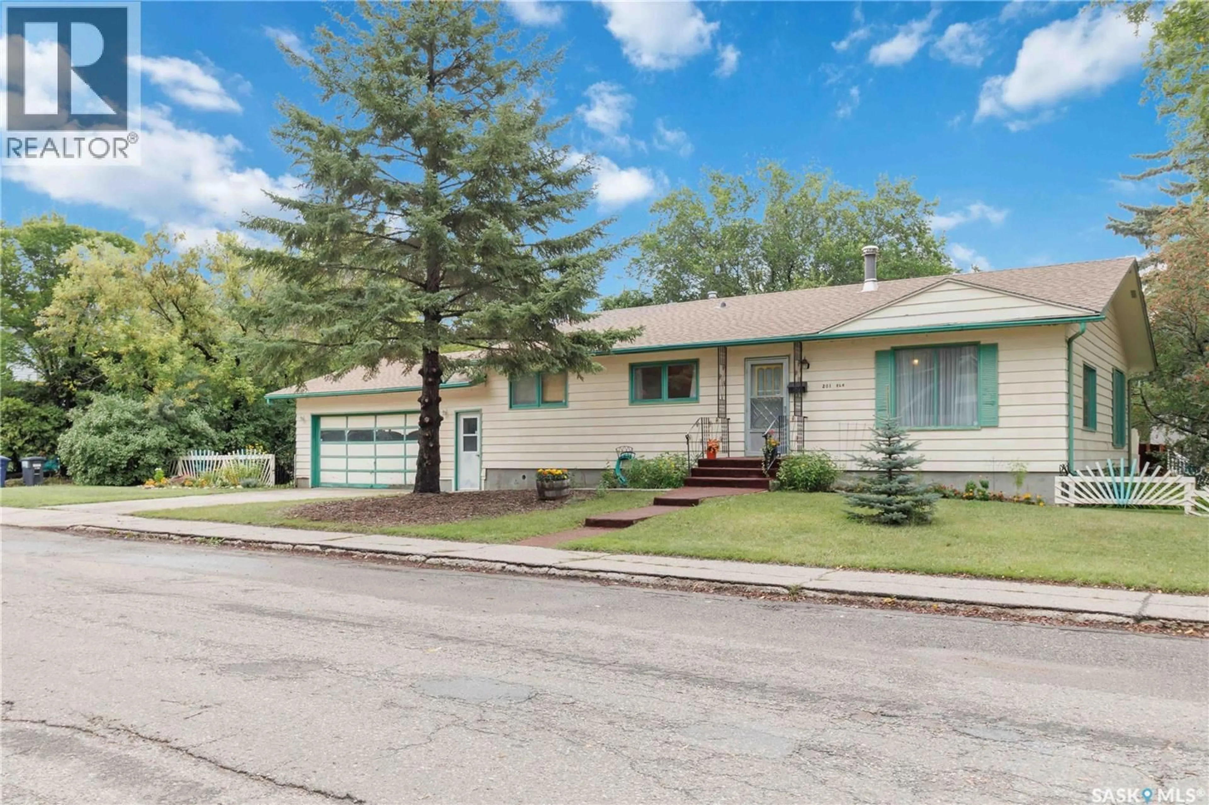 Home with vinyl exterior material, street for 201 ELM STREET, Saskatoon Saskatchewan S7J0G8