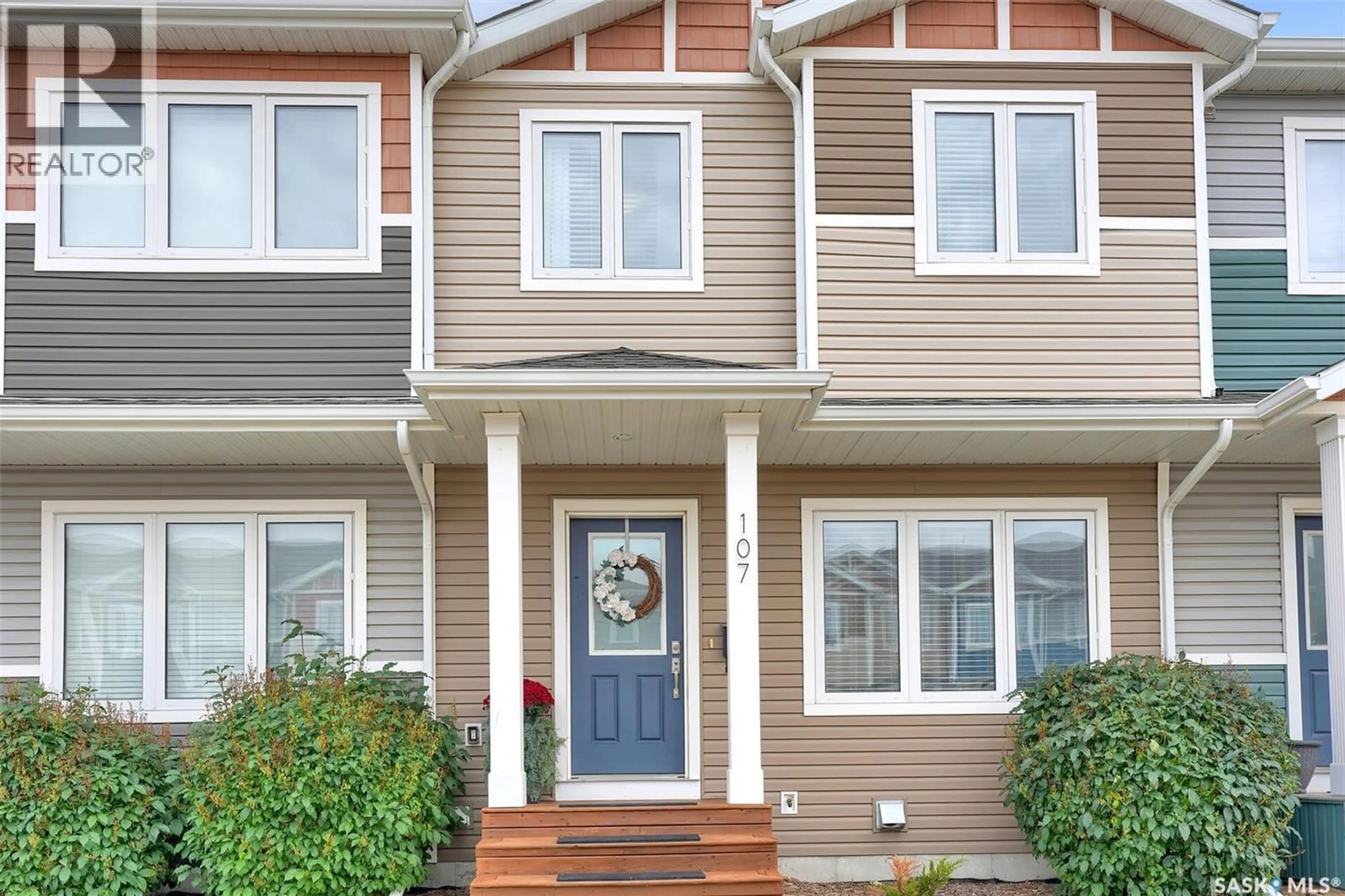 Home with vinyl exterior material, street for 107 1920 7TH AVENUE, Regina Saskatchewan S4N6M9