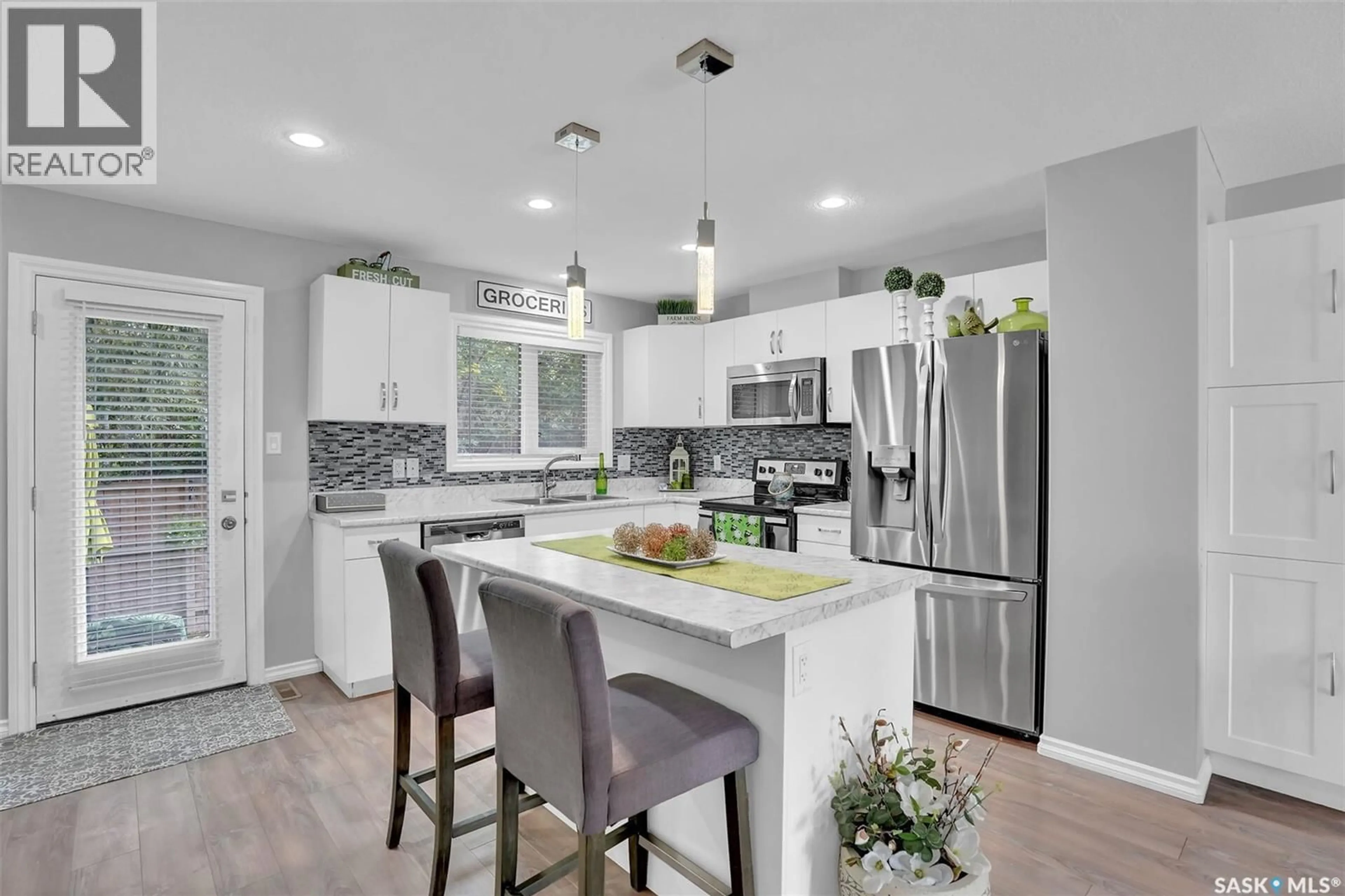 Open concept kitchen, ceramic/tile floor for 107 1920 7TH AVENUE, Regina Saskatchewan S4N6M9
