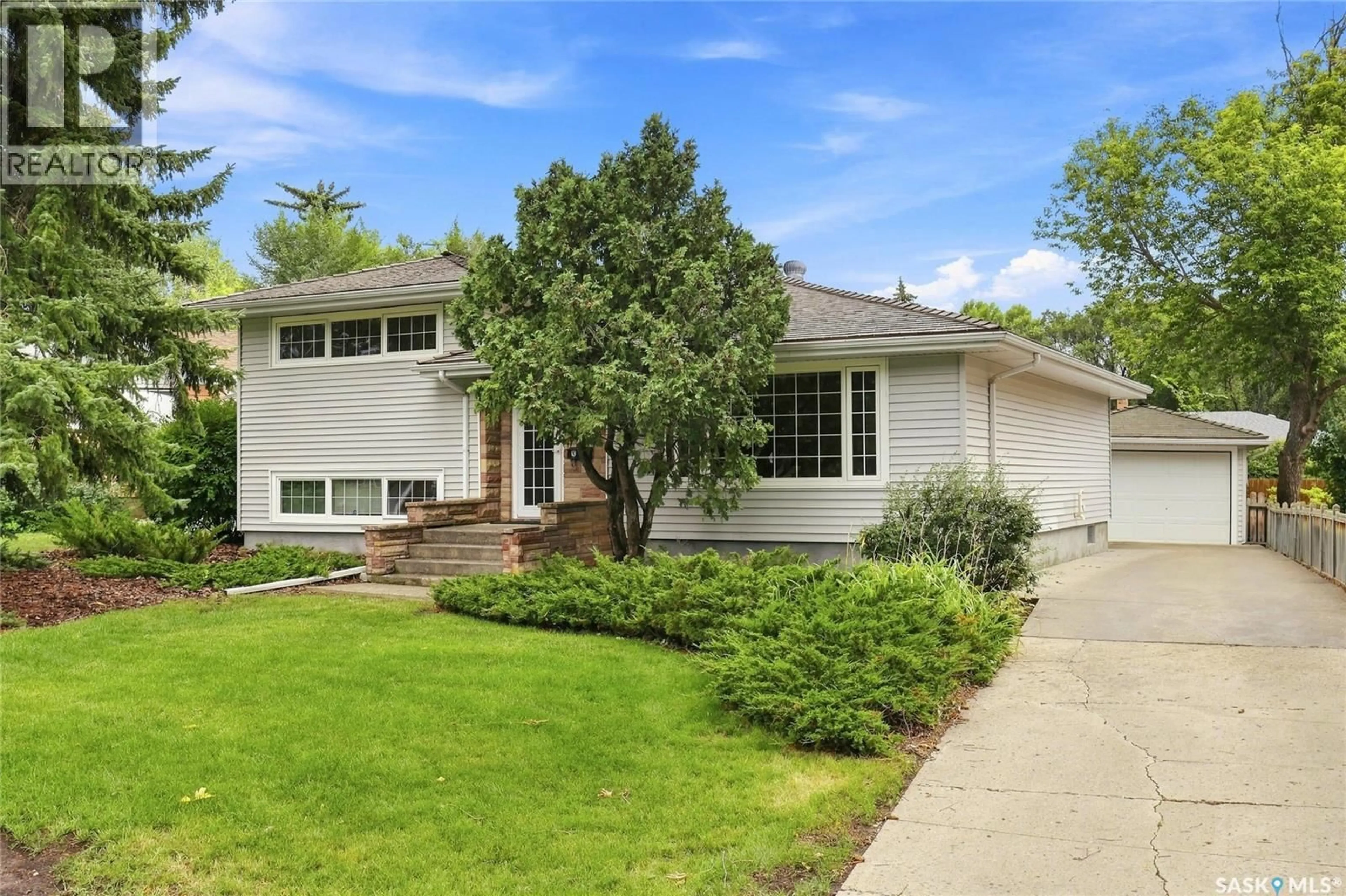 Home with vinyl exterior material, street for 9 DUNN PLACE, Regina Saskatchewan S4S4J4