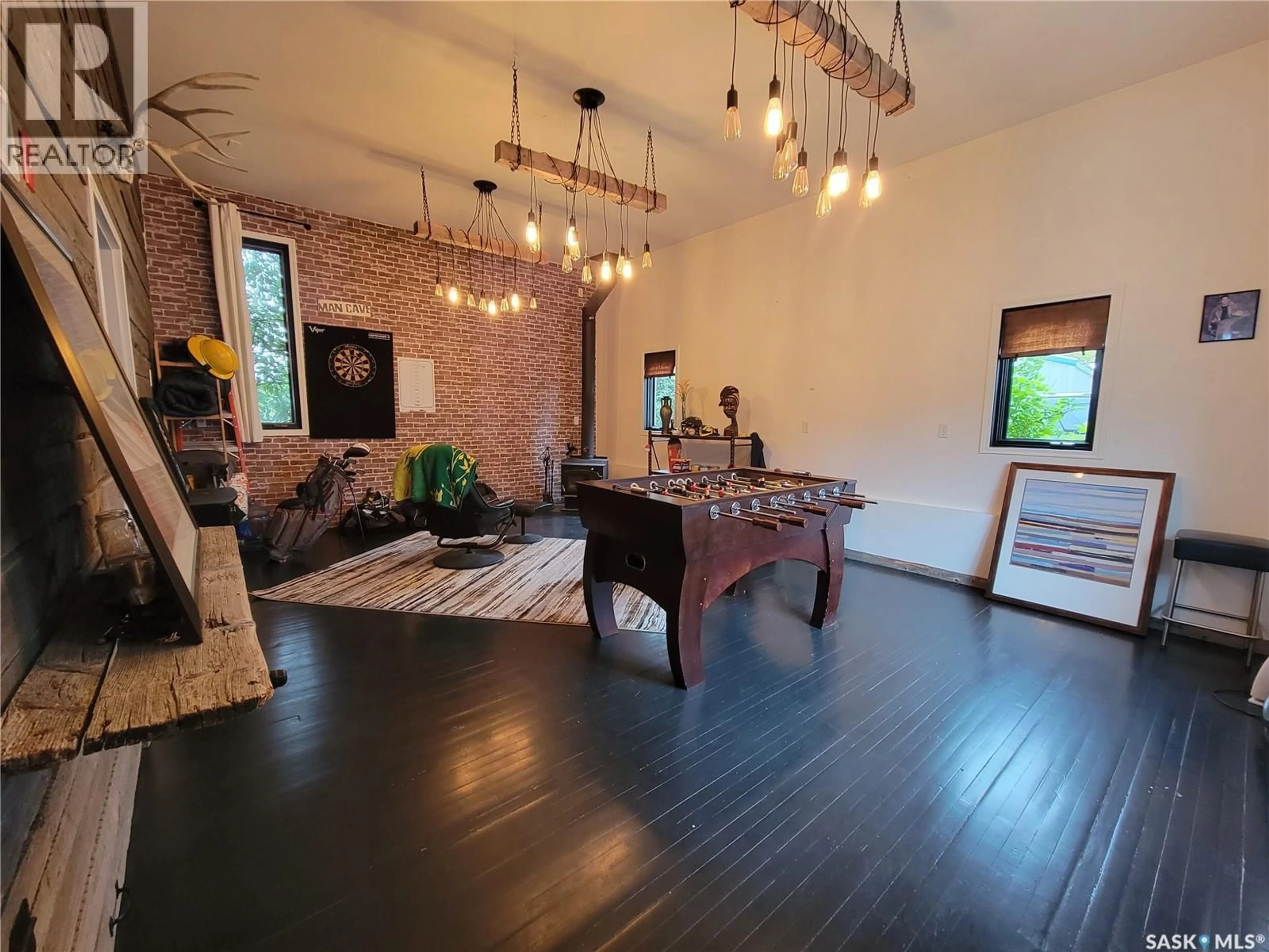 Living room with furniture, wood/laminate floor for MACKLIN LAKE REGIONAL PARK, Macklin Saskatchewan S0L2C0