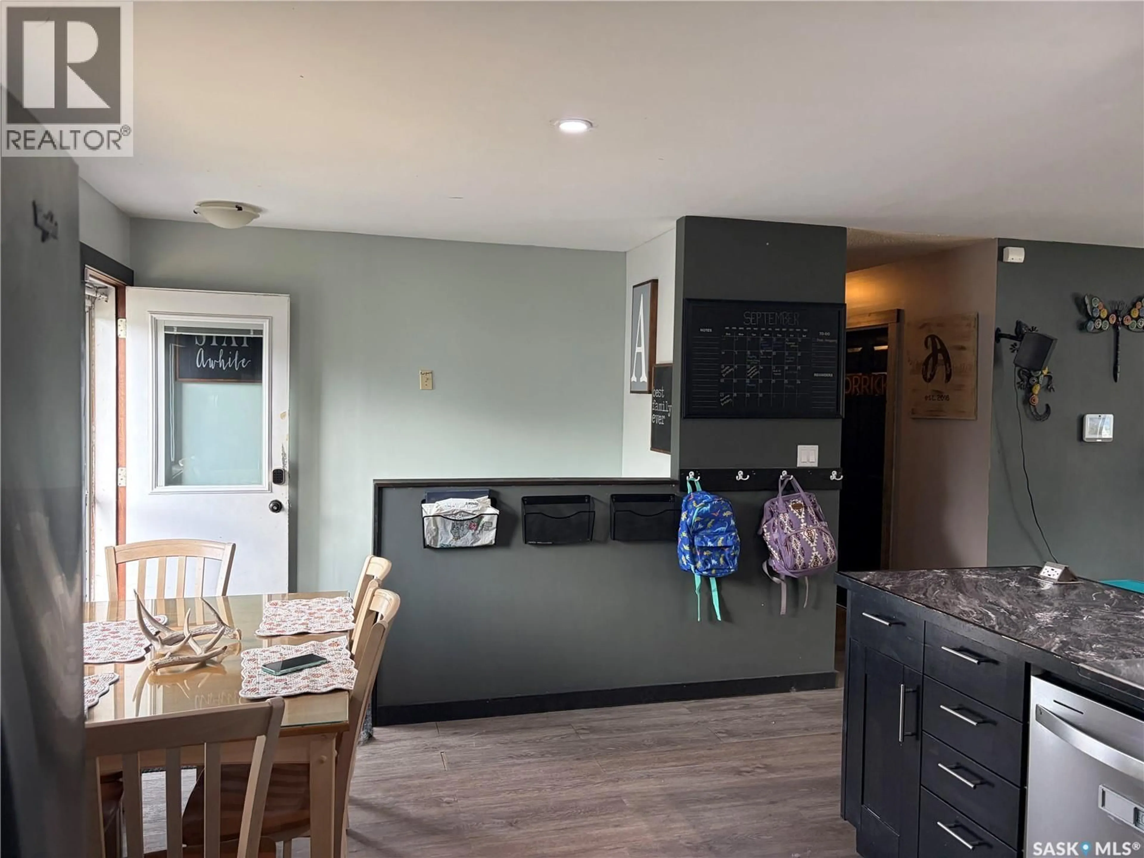 Open concept kitchen, wood/laminate floor for 81 HORKOFF AVENUE, Wadena Saskatchewan S0A4J0