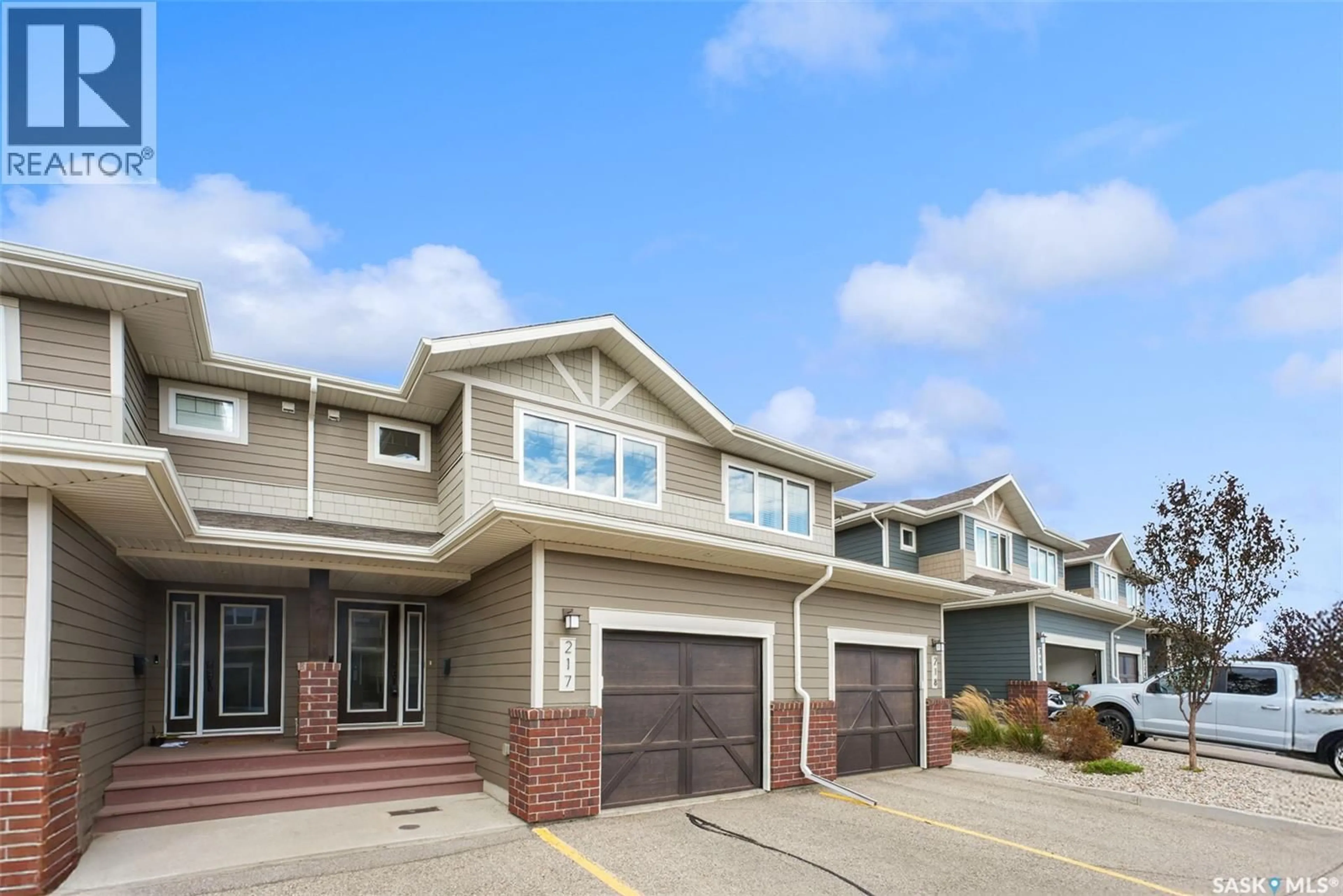 Home with vinyl exterior material, street for 217 - 4002 SANDHILL CRESCENT, Regina Saskatchewan S4V3J1