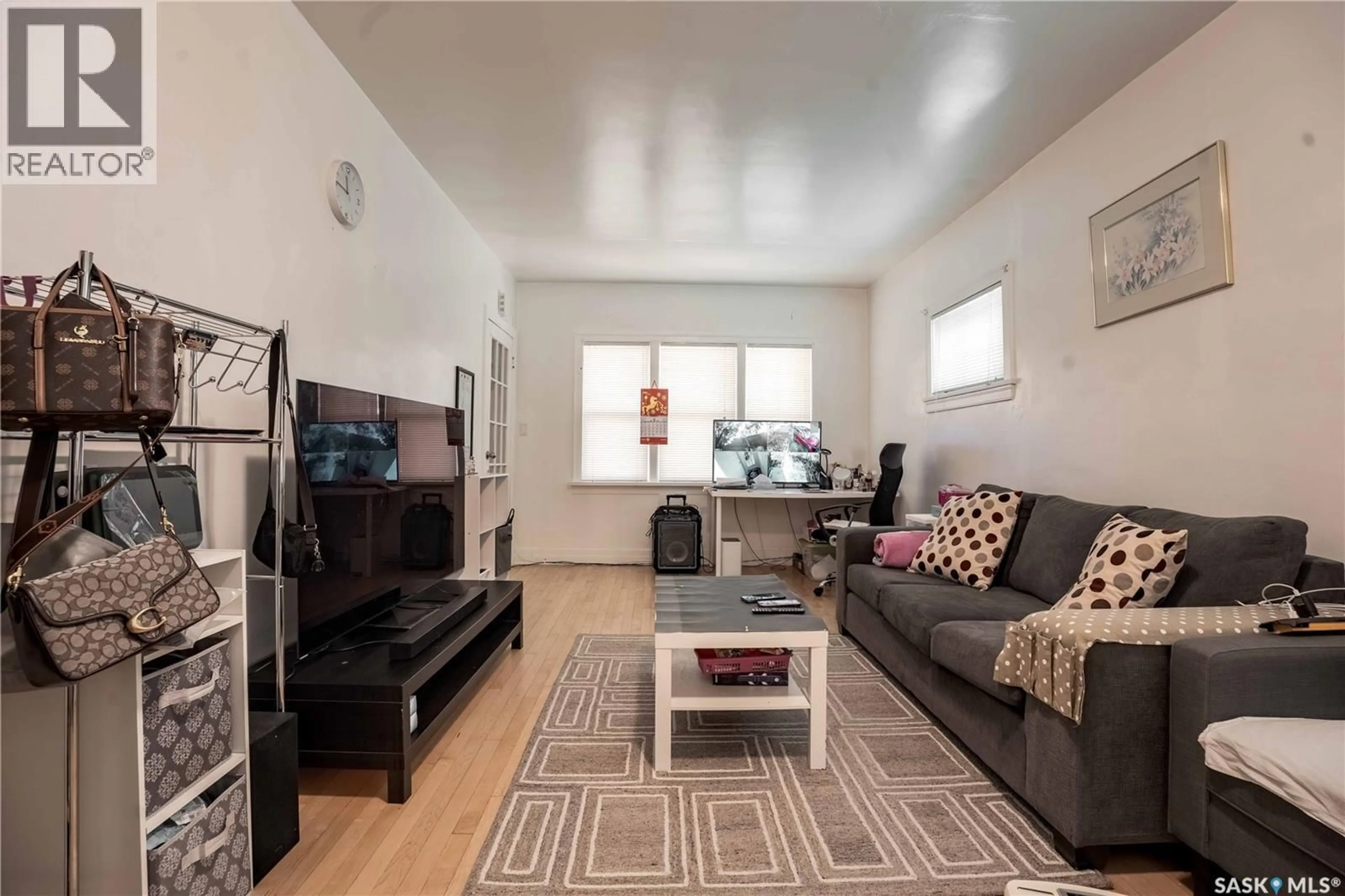 Living room with furniture, unknown for 1903 TORONTO STREET, Regina Saskatchewan S4P1M9