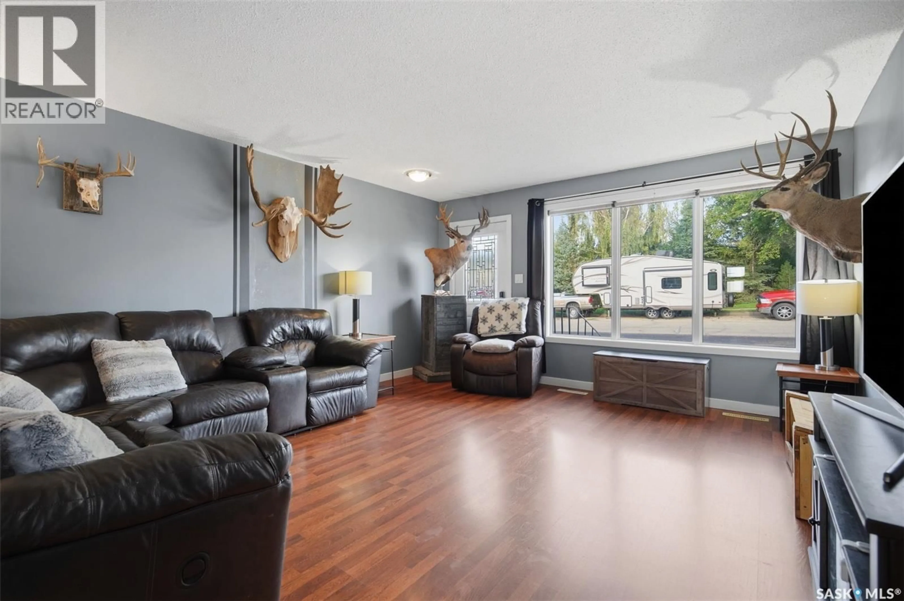 Living room with furniture, unknown for 212 3RD STREET, Delisle Saskatchewan S0L0P0