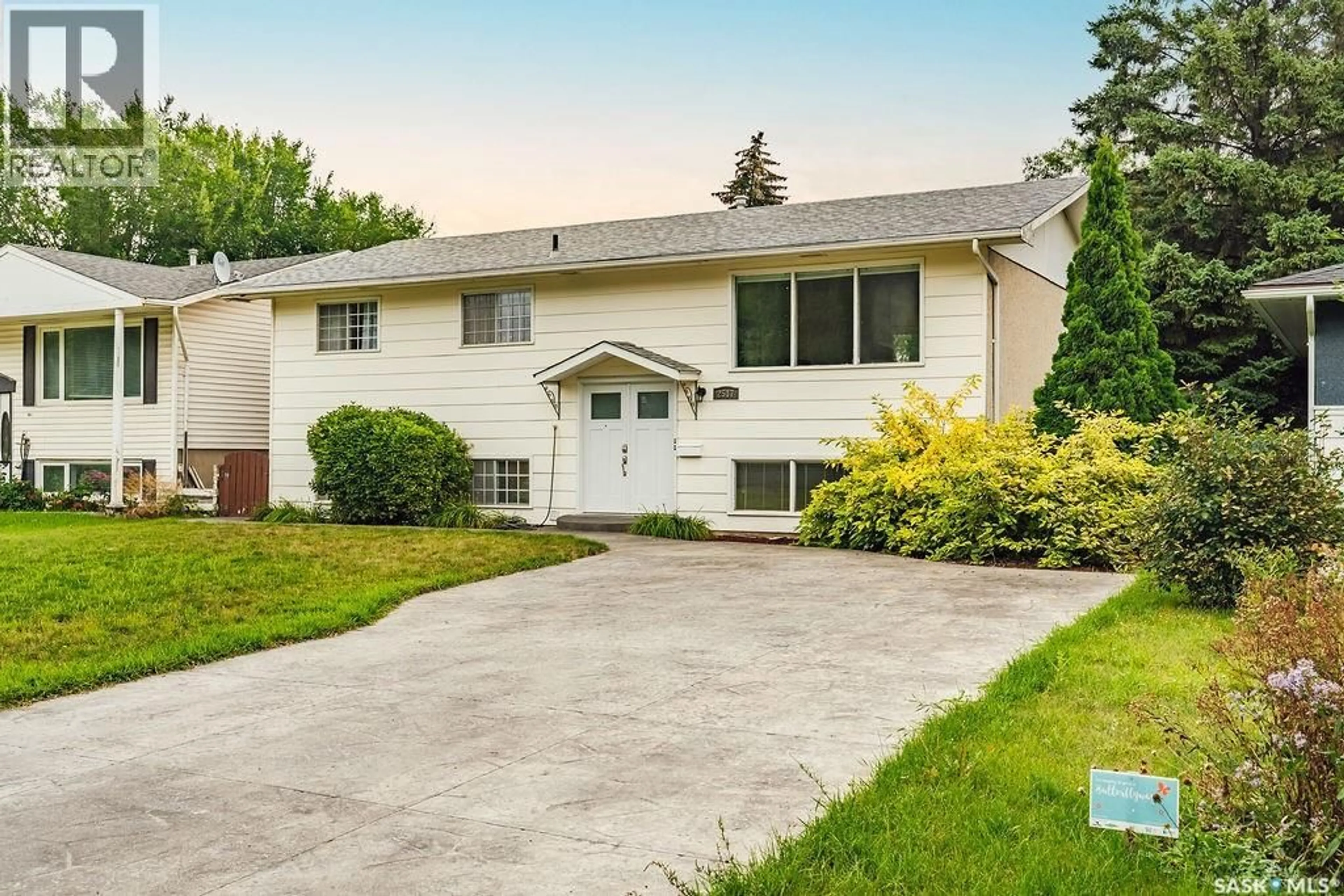 Home with vinyl exterior material, street for 2517 PRESTON AVENUE, Saskatoon Saskatchewan S7J2G3