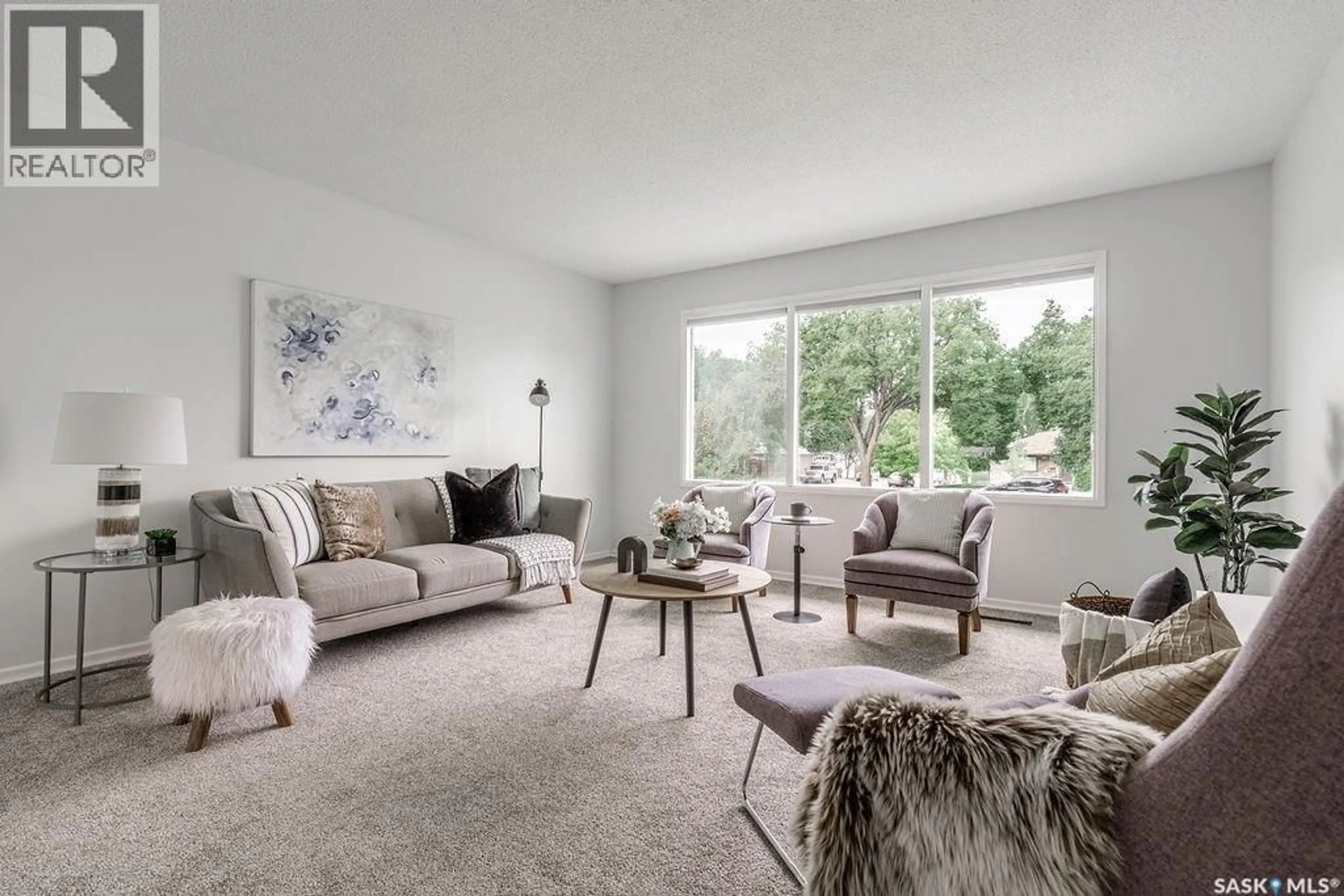 Living room with furniture, carpet floor for 2517 PRESTON AVENUE, Saskatoon Saskatchewan S7J2G3