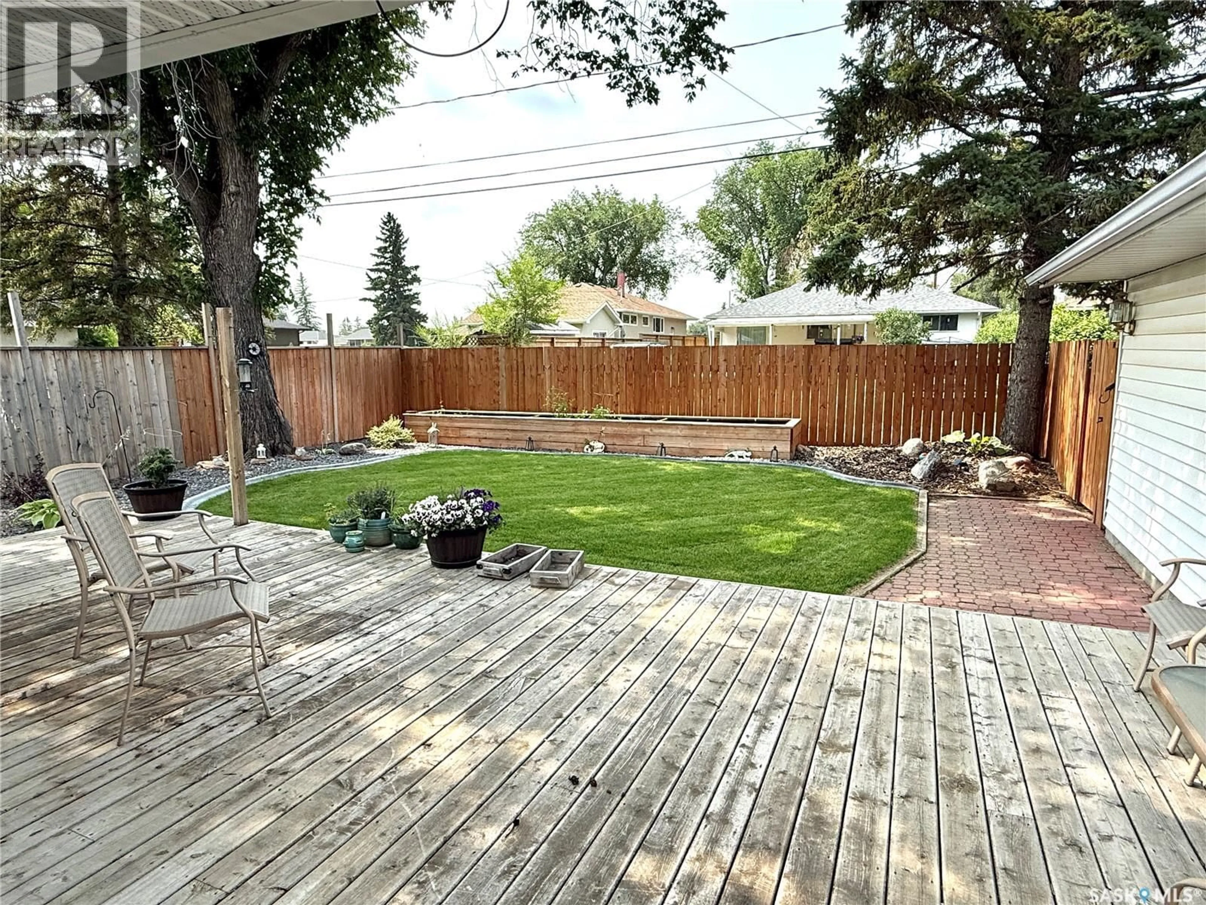 Patio, street for 1711 93RD STREET, North Battleford Saskatchewan S9A0C7