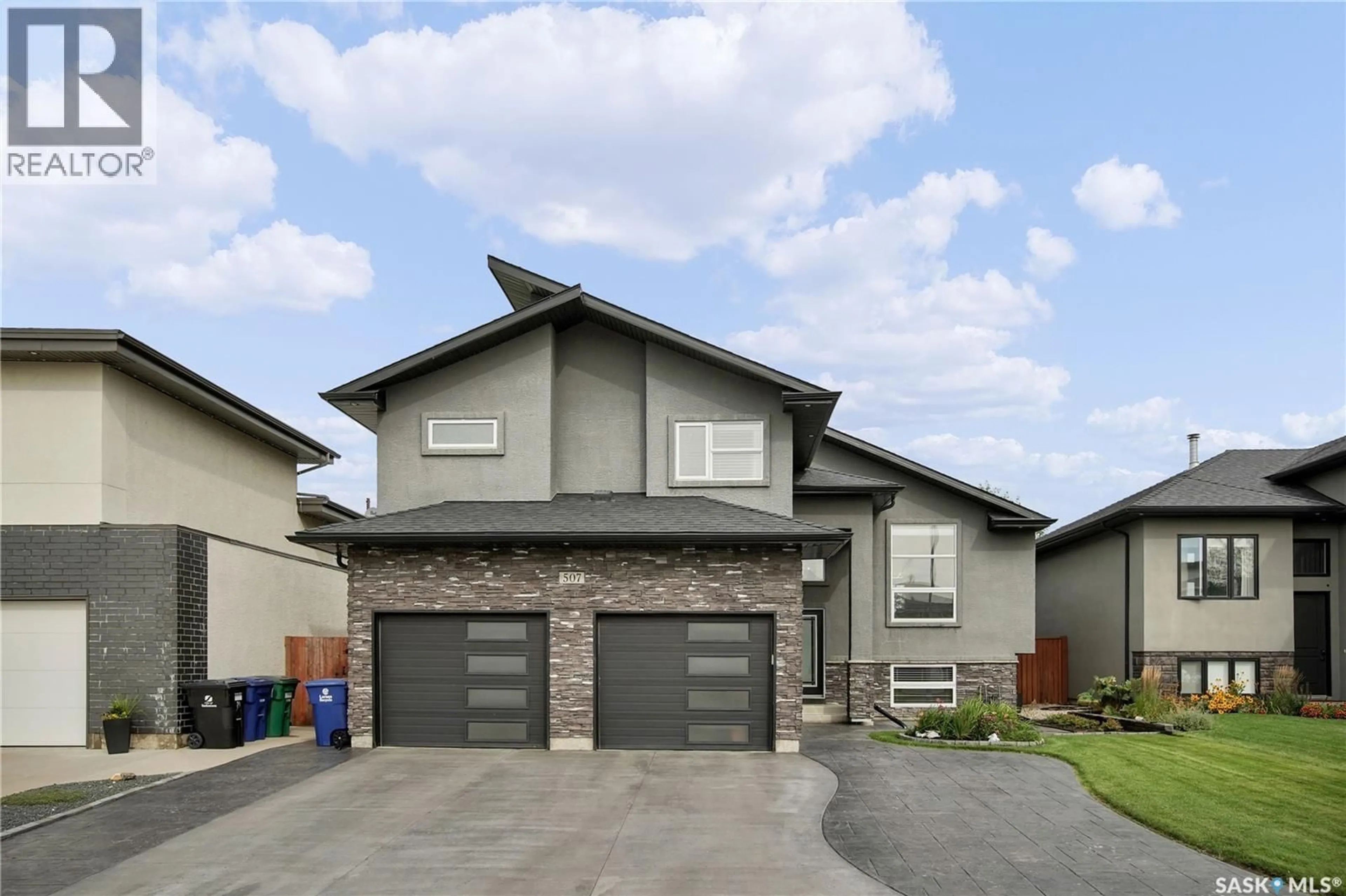 Home with brick exterior material, street for 507 SALLOUM CRESCENT, Saskatoon Saskatchewan S7W0N1
