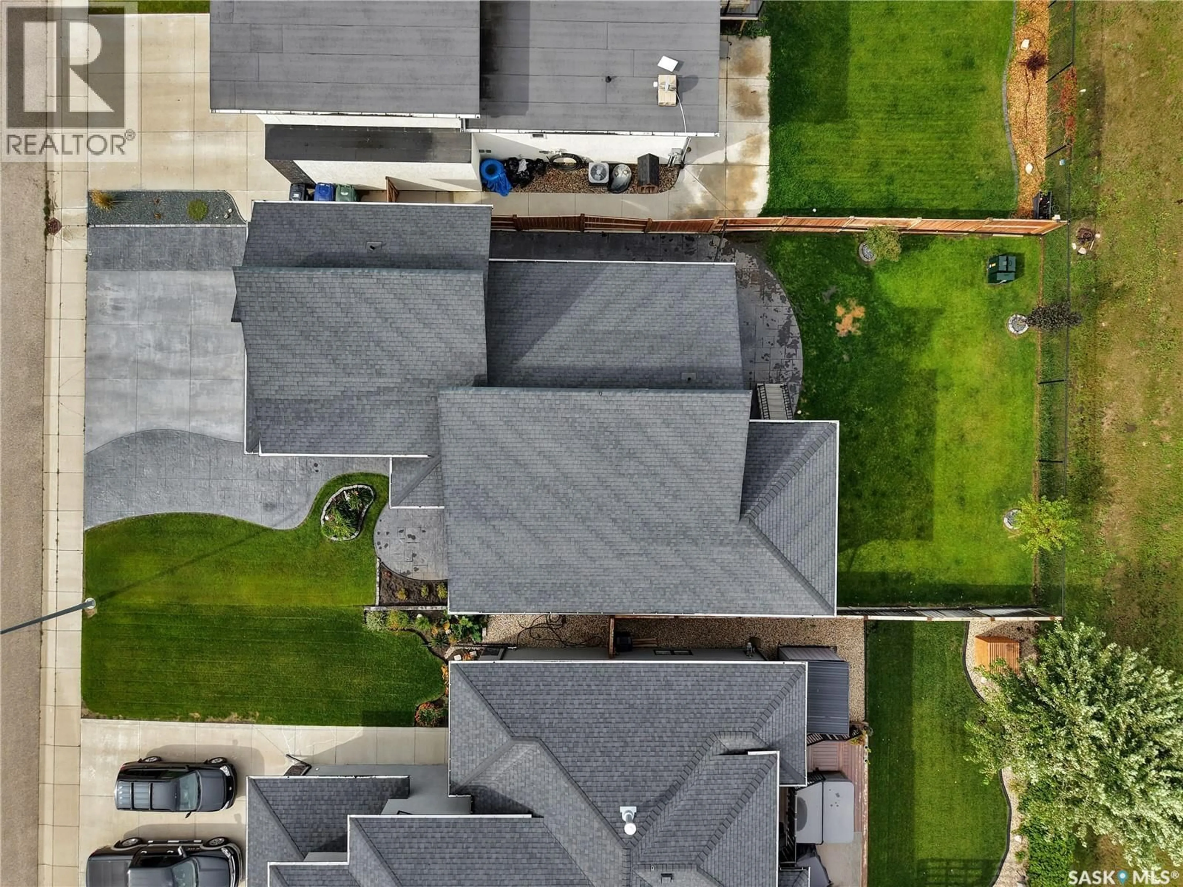 A pic from outside/outdoor area/front of a property/back of a property/a pic from drone, street for 507 SALLOUM CRESCENT, Saskatoon Saskatchewan S7W0N1