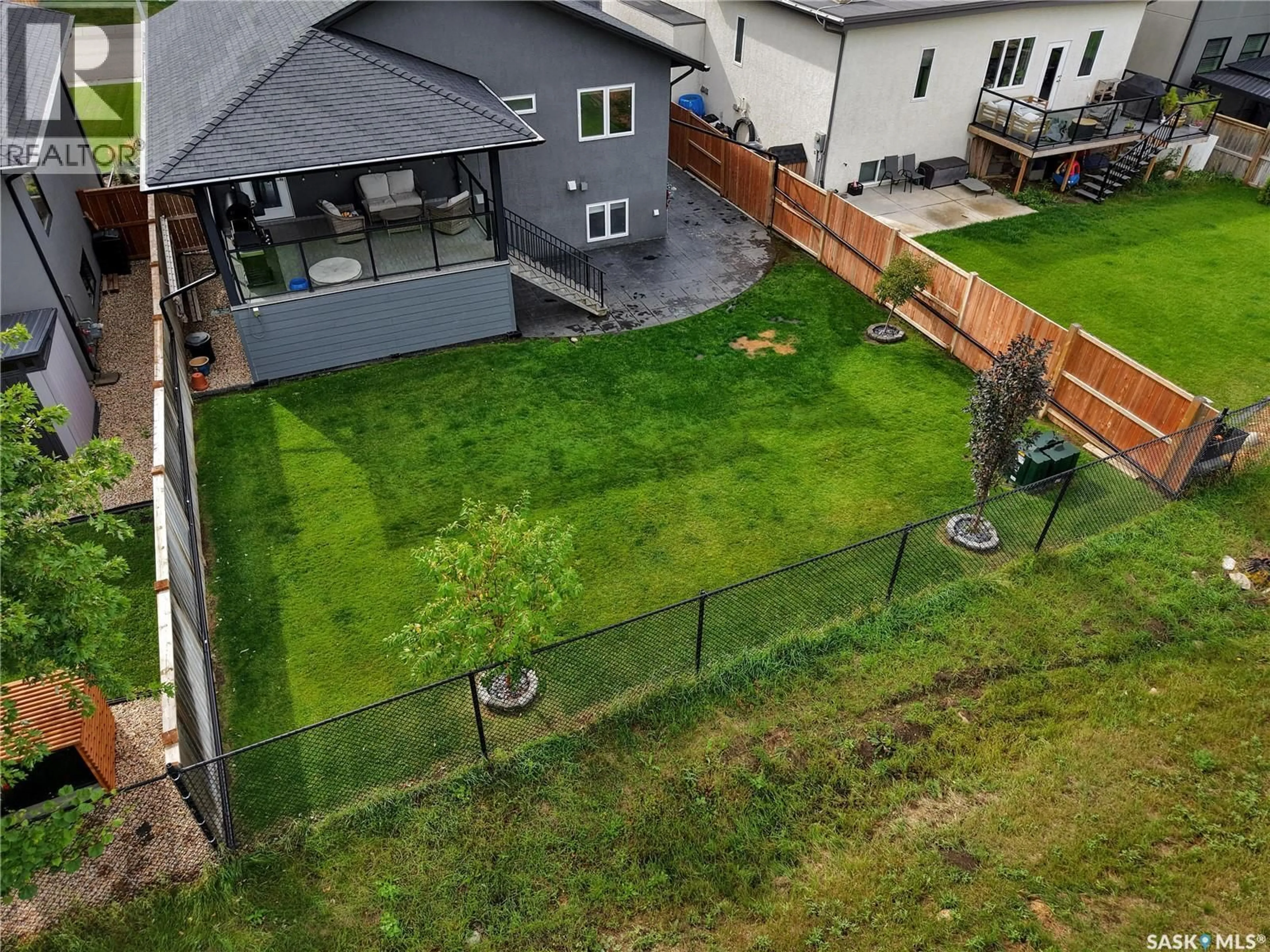 A pic from outside/outdoor area/front of a property/back of a property/a pic from drone, mountain view for 507 SALLOUM CRESCENT, Saskatoon Saskatchewan S7W0N1