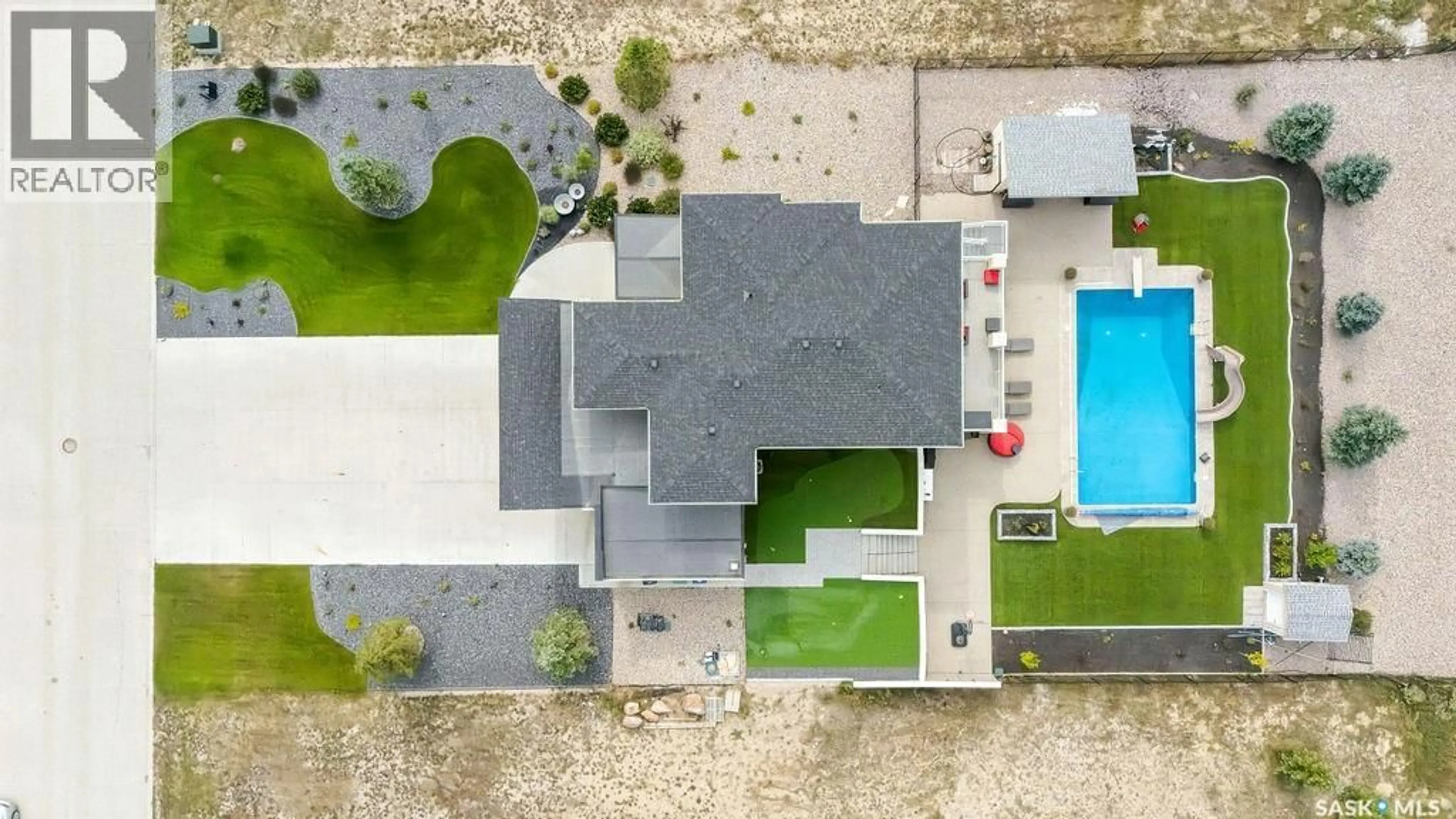 A pic from outside/outdoor area/front of a property/back of a property/a pic from drone, street for 309 SPRUCE CREEK CRESCENT, Edenwold Rm No.158 Saskatchewan S0G3Z0
