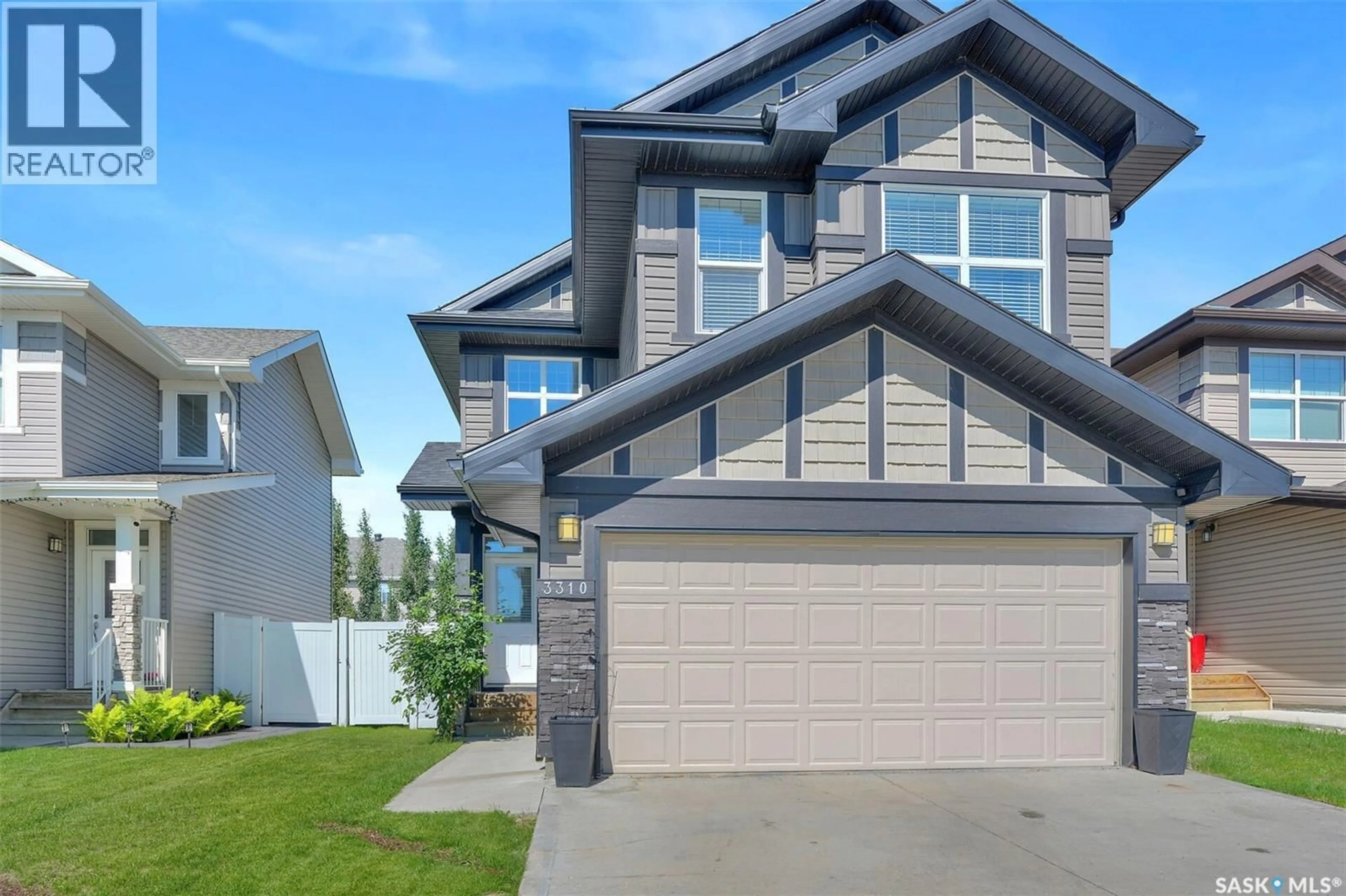 Home with vinyl exterior material, street for 3310 GREEN LILY ROAD, Regina Saskatchewan S4V3M2