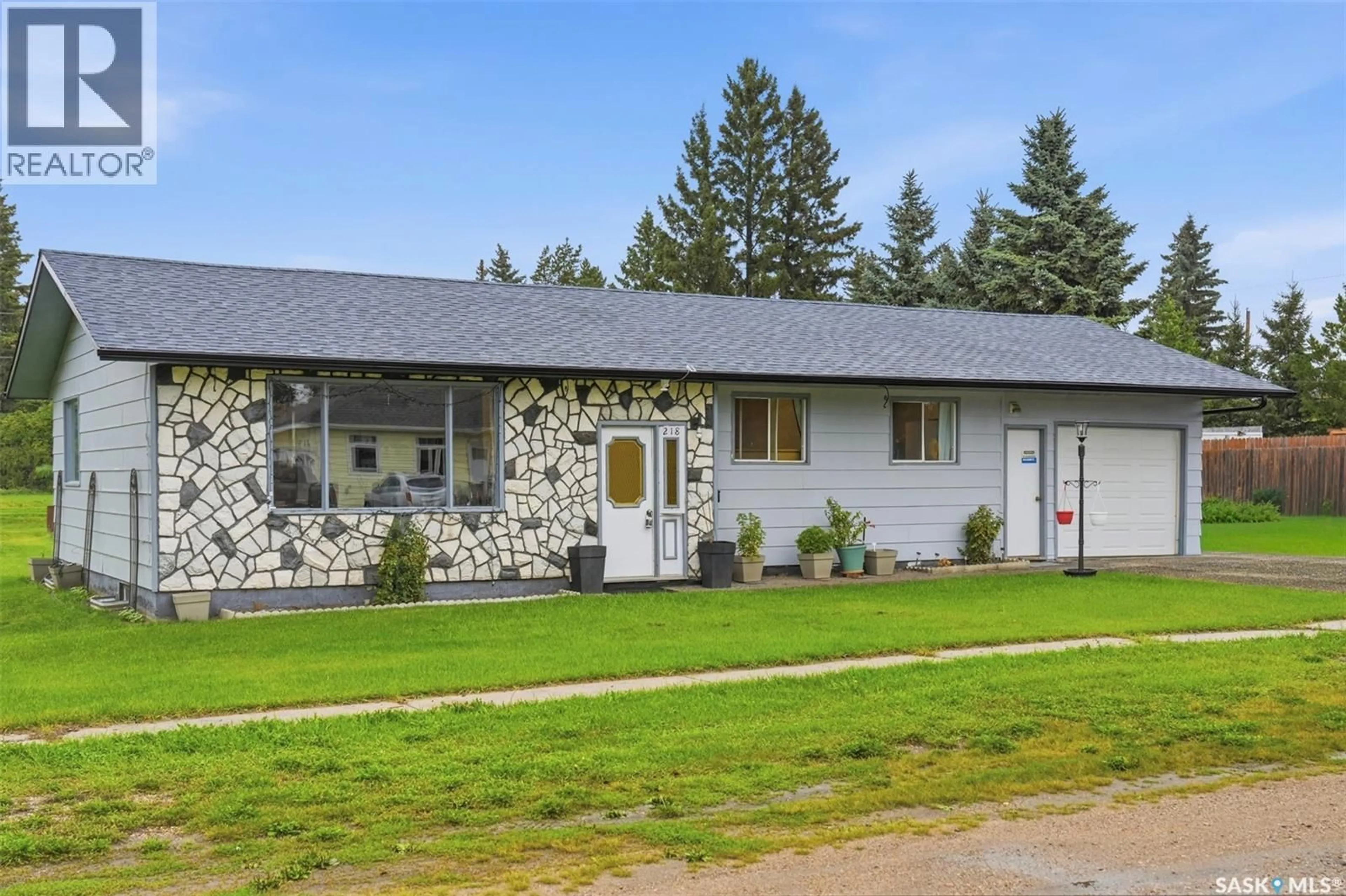 Home with vinyl exterior material, street for W - 218 PRINCESS AVENUE, Hafford Saskatchewan S0J1A0