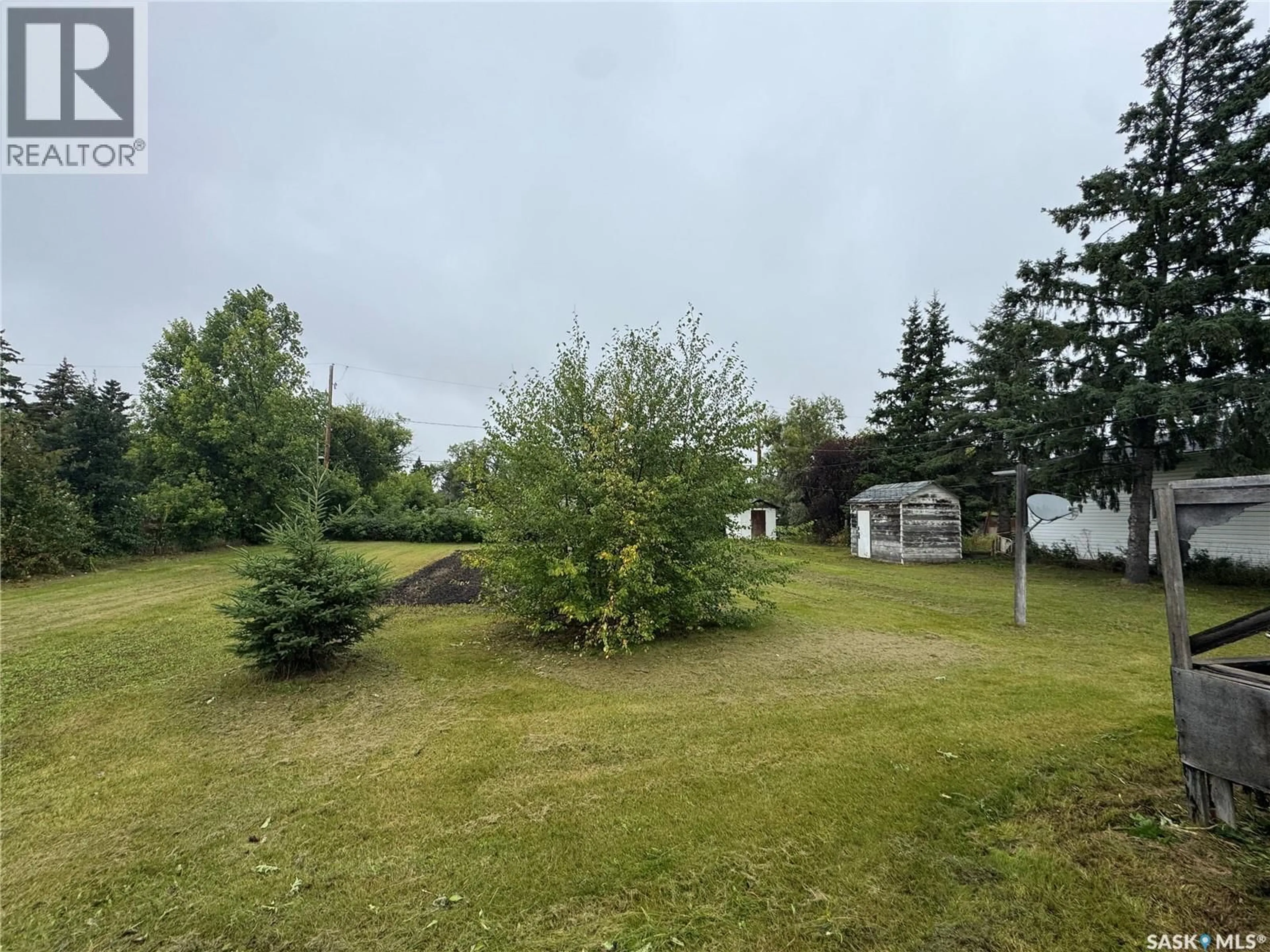 A pic from outside/outdoor area/front of a property/back of a property/a pic from drone, forest/trees view for 110 HUDEK AVENUE, Hafford Saskatchewan S0J1A0