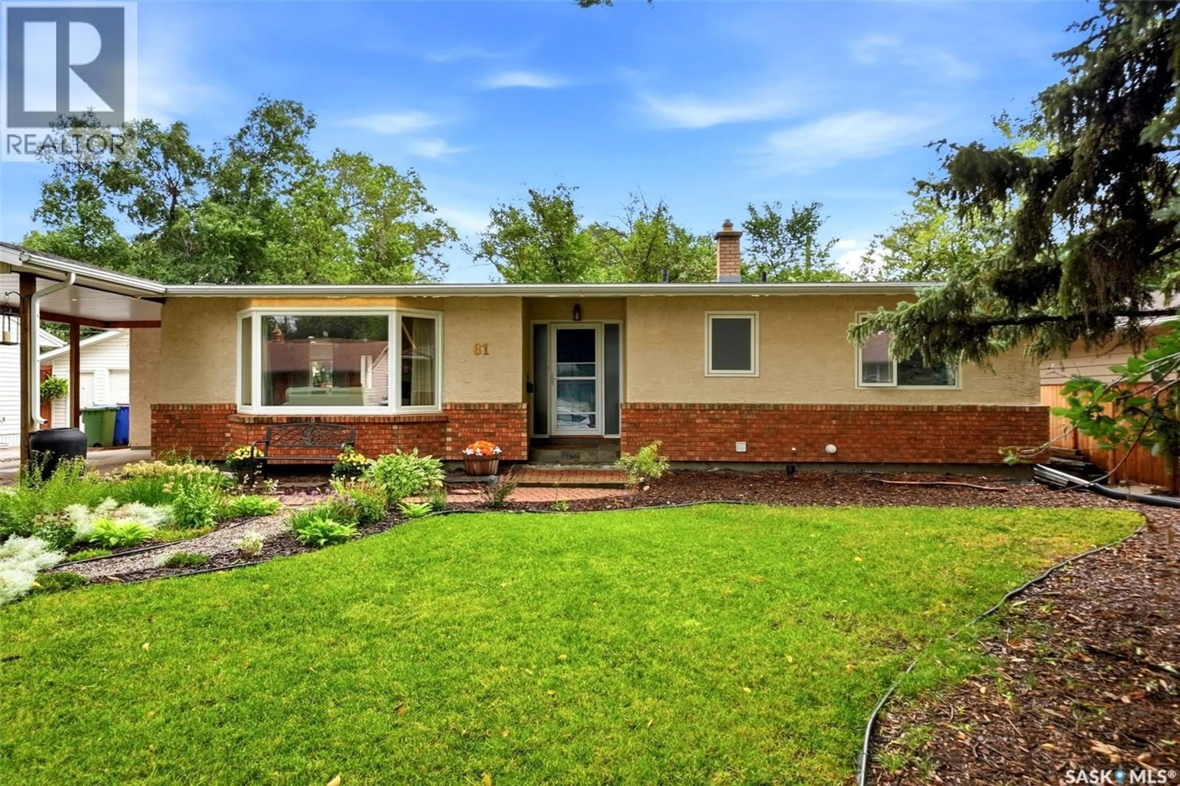 Home with brick exterior material, street for 81 DOLPHIN BAY, Regina Saskatchewan S4S4Z9