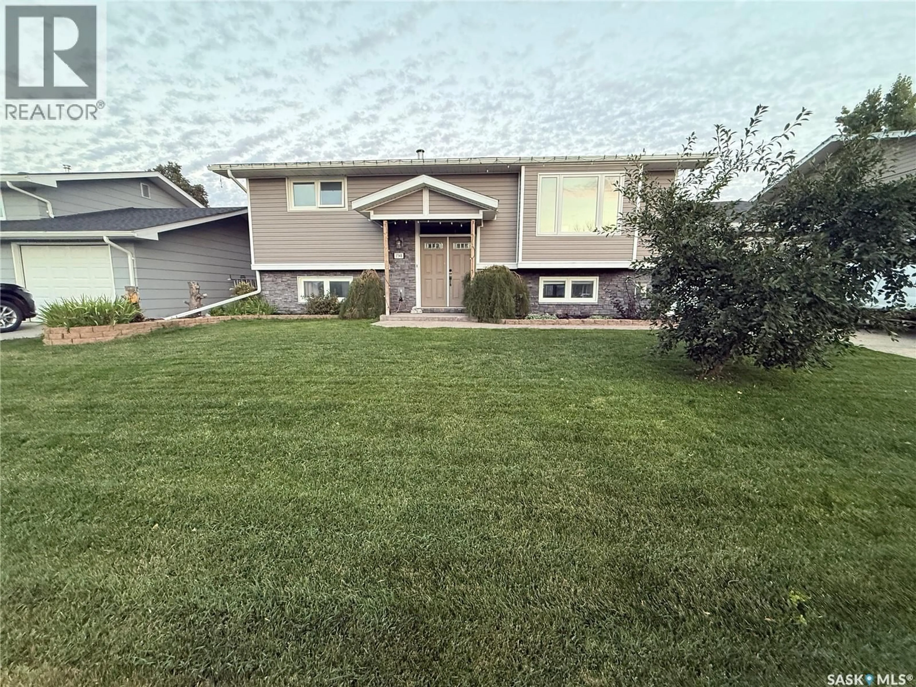 A pic from outside/outdoor area/front of a property/back of a property/a pic from drone, street for 1348 PRINCESS CRESCENT, Moose Jaw Saskatchewan S6H6S9