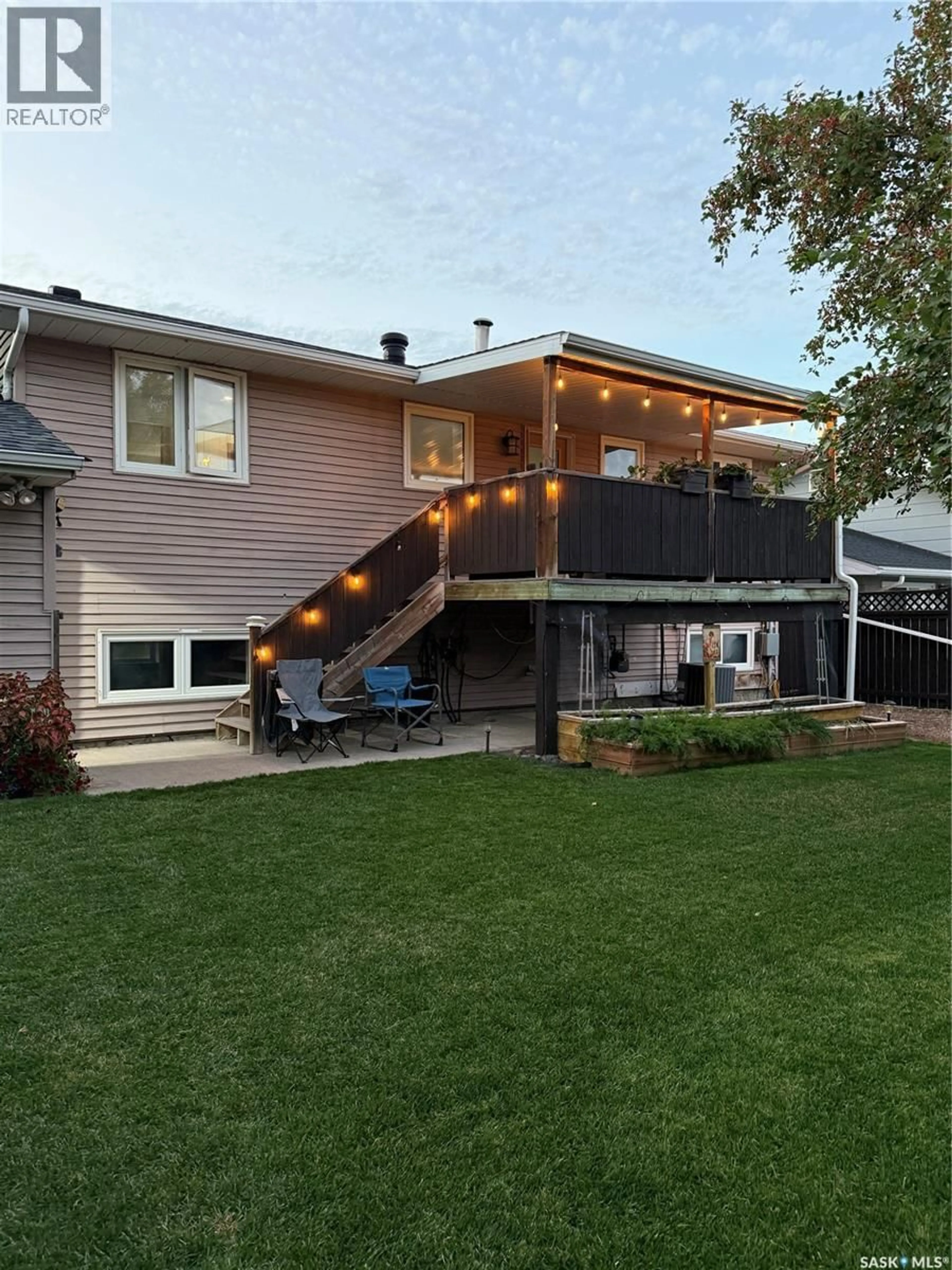Home with vinyl exterior material, street for 1348 PRINCESS CRESCENT, Moose Jaw Saskatchewan S6H6S9
