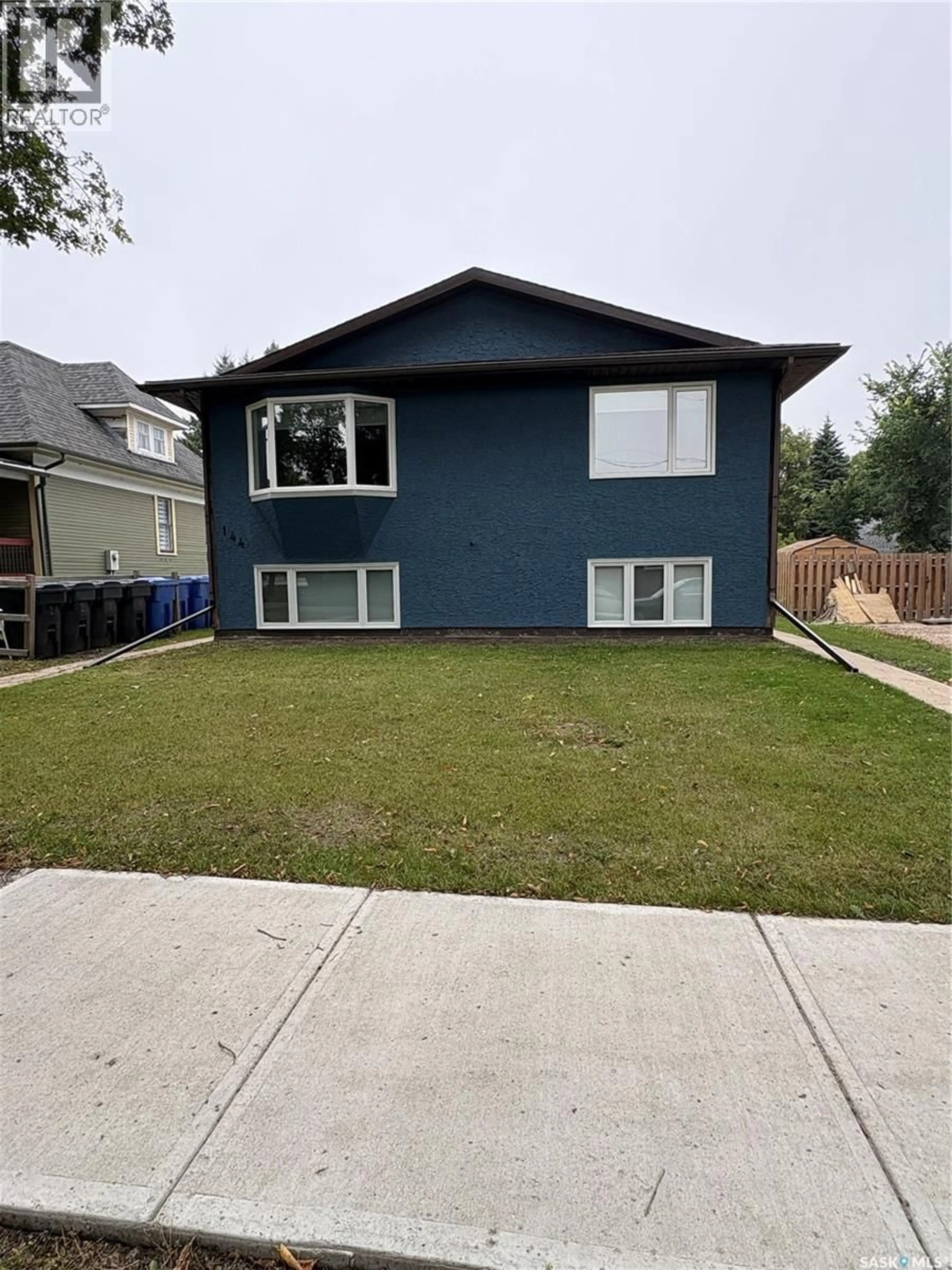 Home with vinyl exterior material, street for 144 FIRST AVENUE, Yorkton Saskatchewan S3N1J8