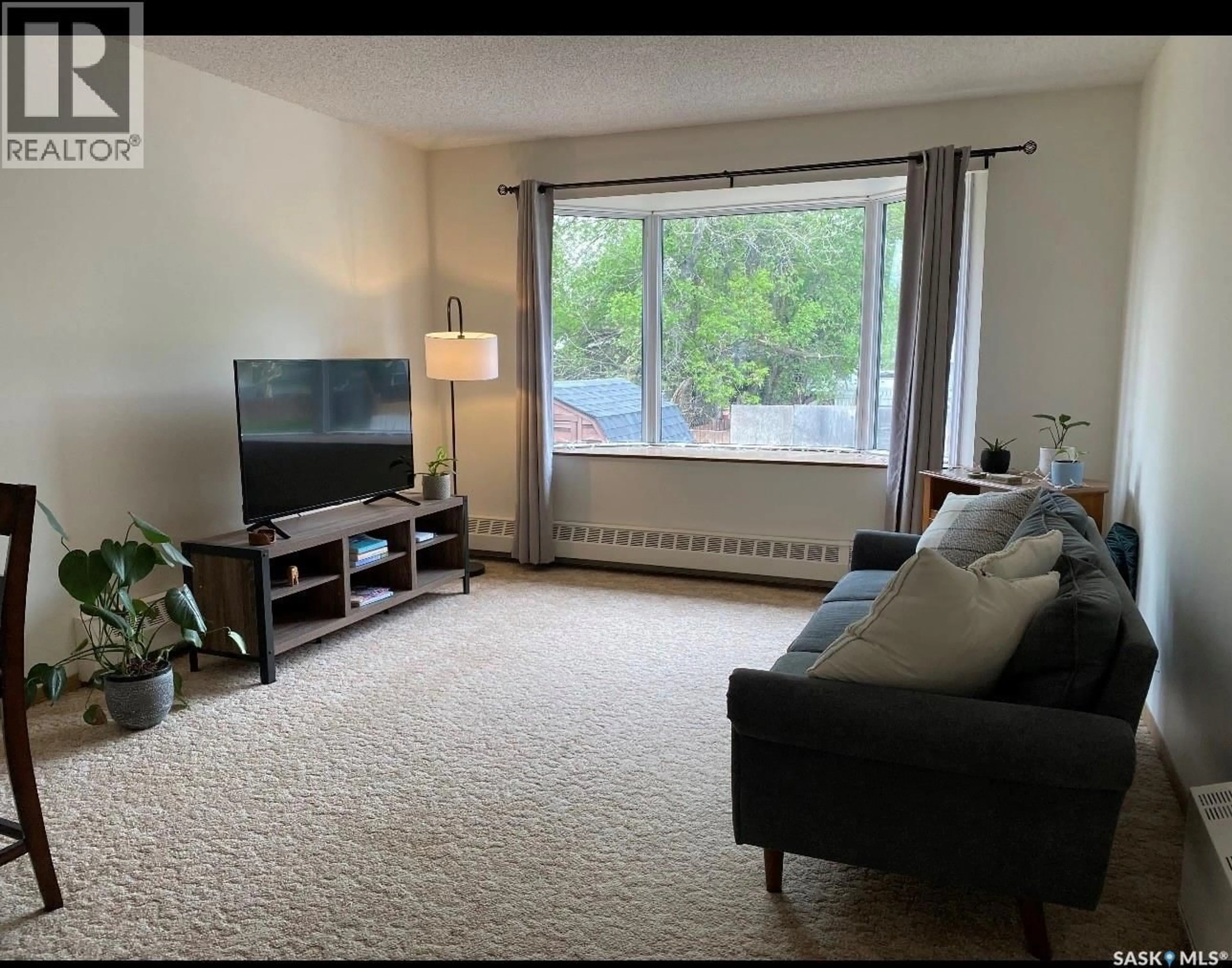 Living room with furniture, unknown for 144 FIRST AVENUE, Yorkton Saskatchewan S3N1J8