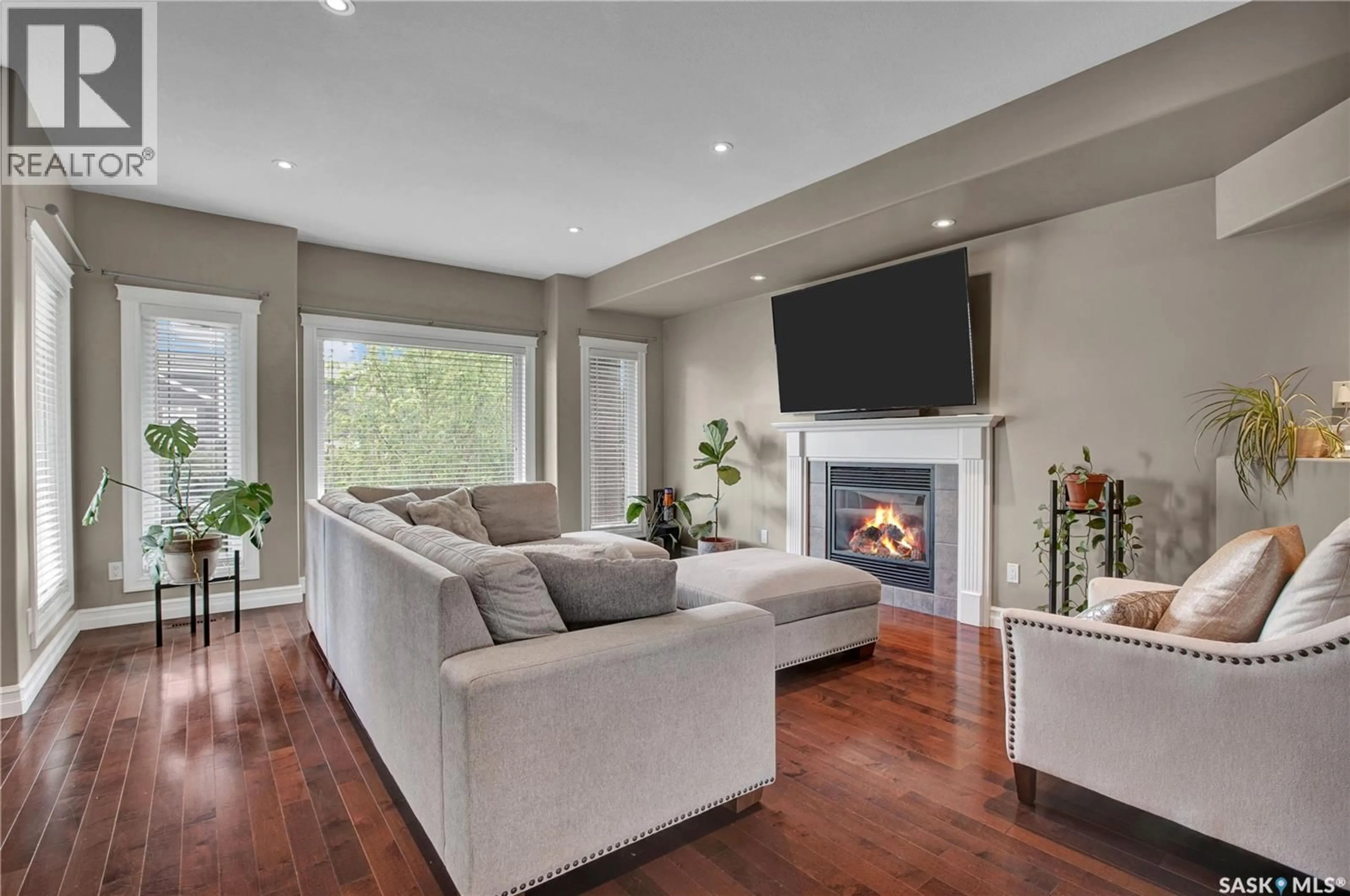 Living room with furniture, wood/laminate floor for 1304 5TH AVENUE, Saskatoon Saskatchewan S7K2S2