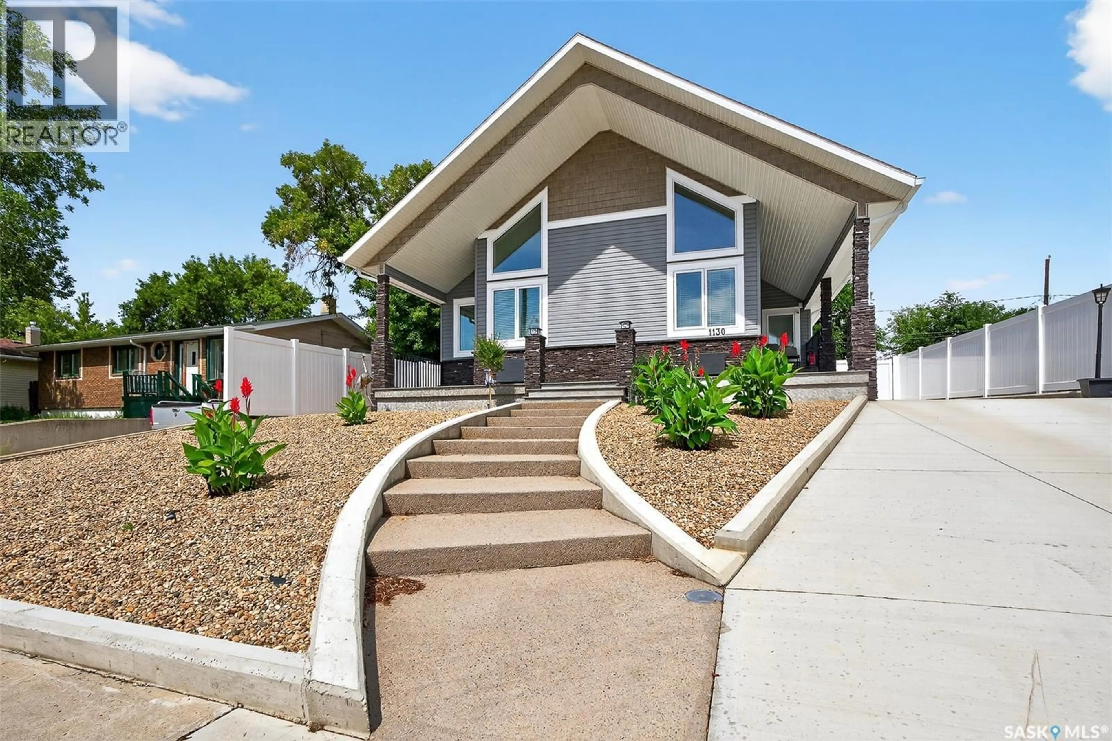 Home with vinyl exterior material, street for 1130 STADACONA STREET, Moose Jaw Saskatchewan S6H2B3