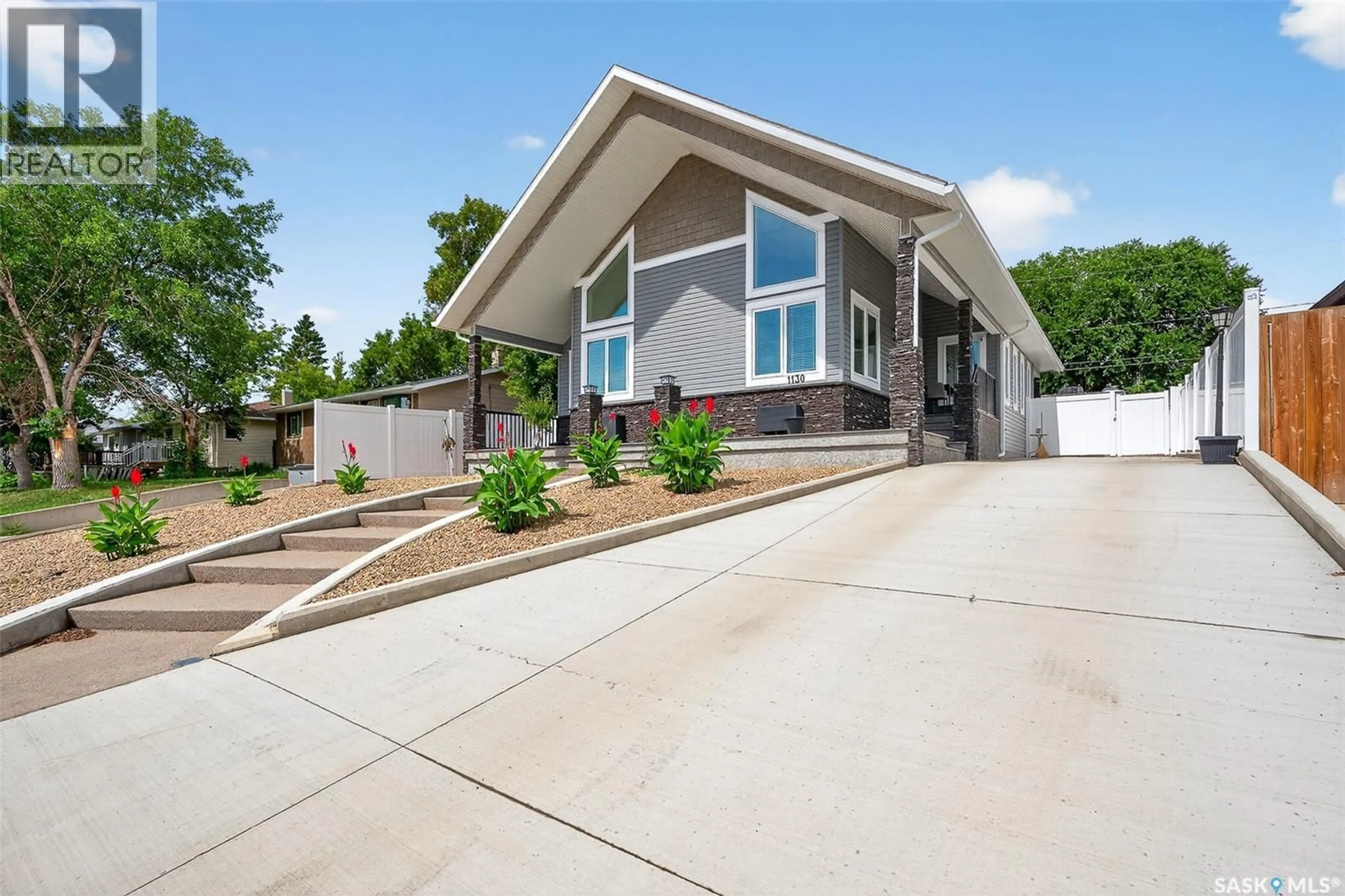 Home with vinyl exterior material, street for 1130 STADACONA STREET, Moose Jaw Saskatchewan S6H2B3