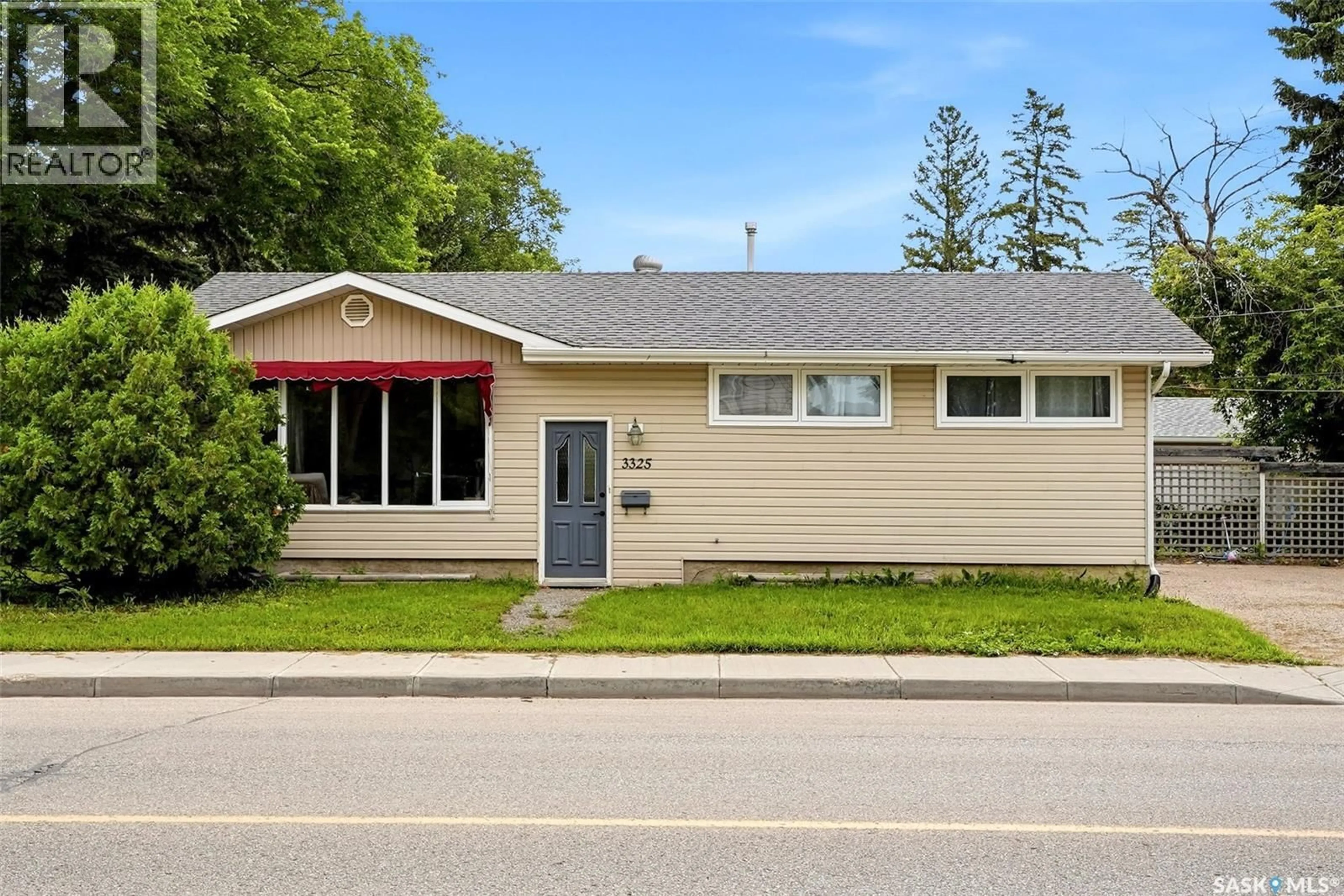 Home with vinyl exterior material, street for 3325 29TH AVENUE, Regina Saskatchewan S4S2P1