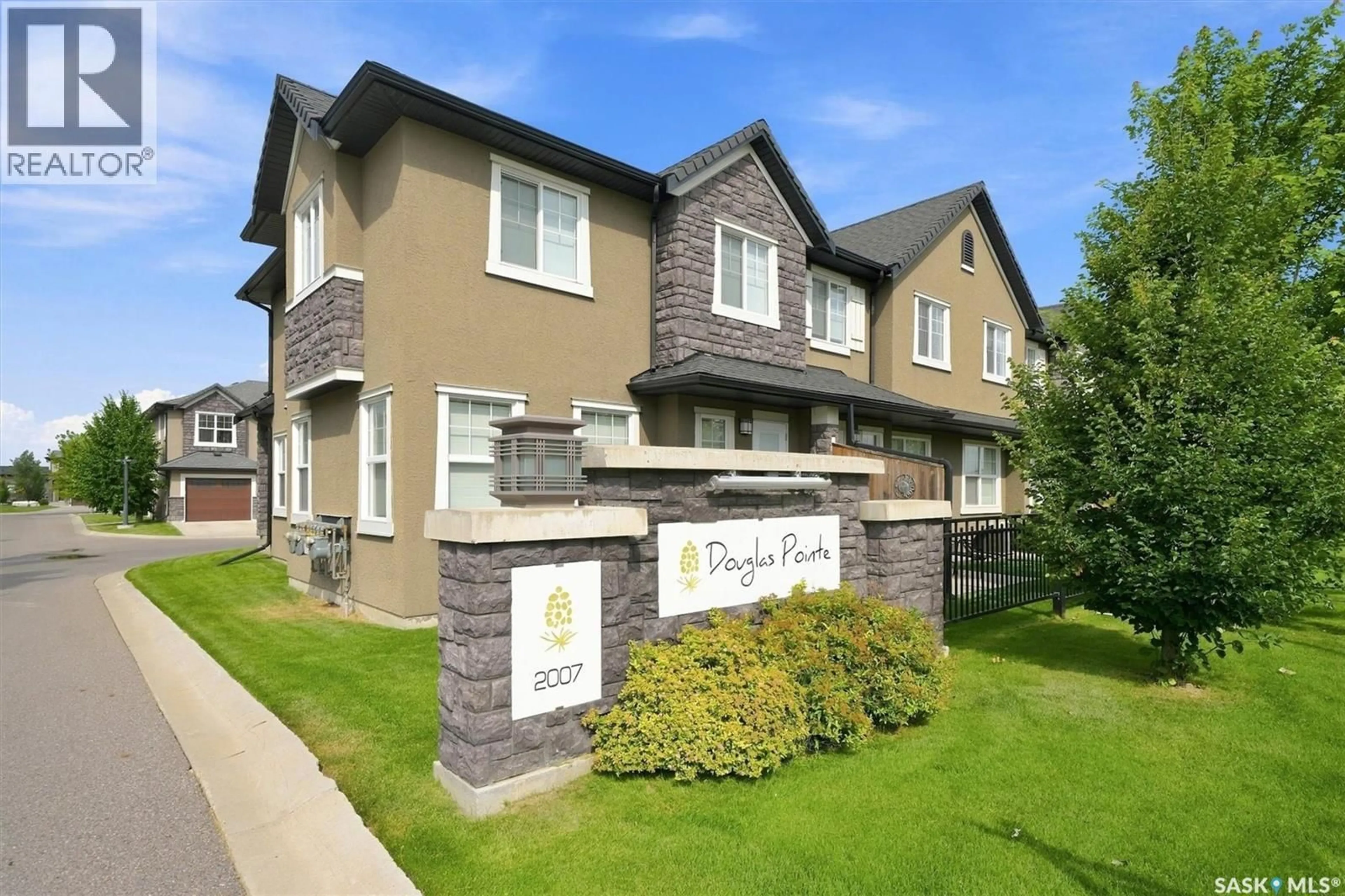 Home with brick exterior material, street for 203 - 2007 POHORECKY CRESCENT, Saskatoon Saskatchewan S7W0V3