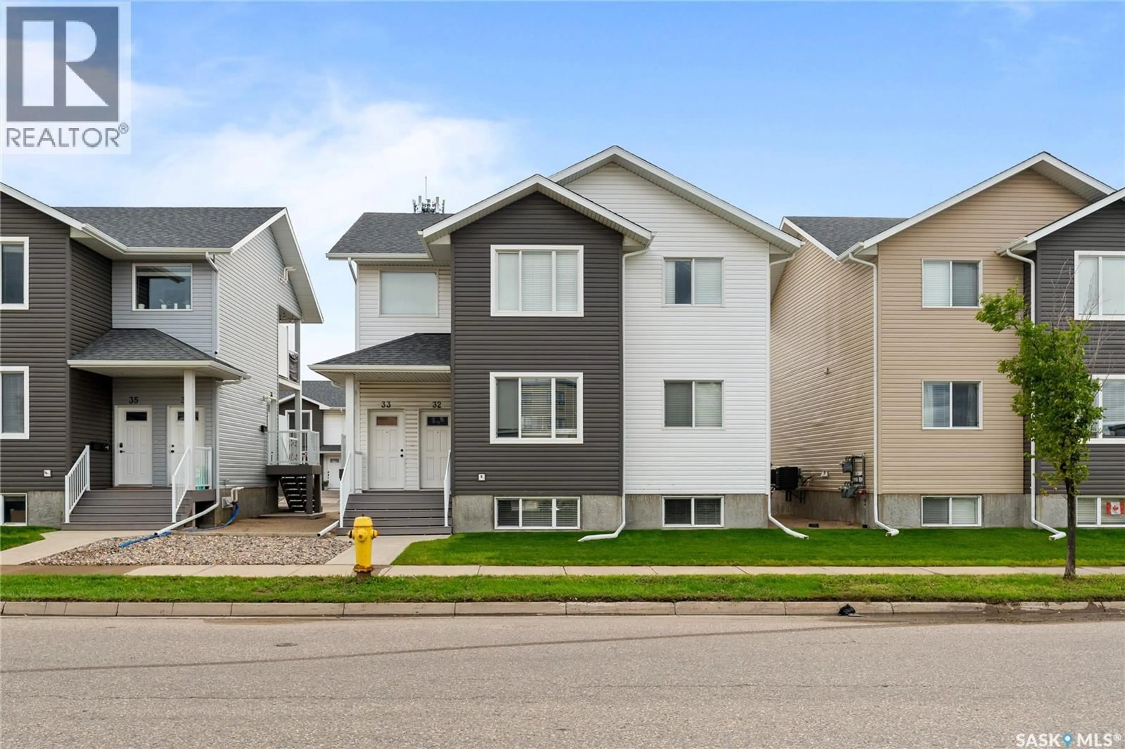 Home with vinyl exterior material, street for 4850 - 33 HARBOUR LANDING DRIVE, Regina Saskatchewan S4W0K9