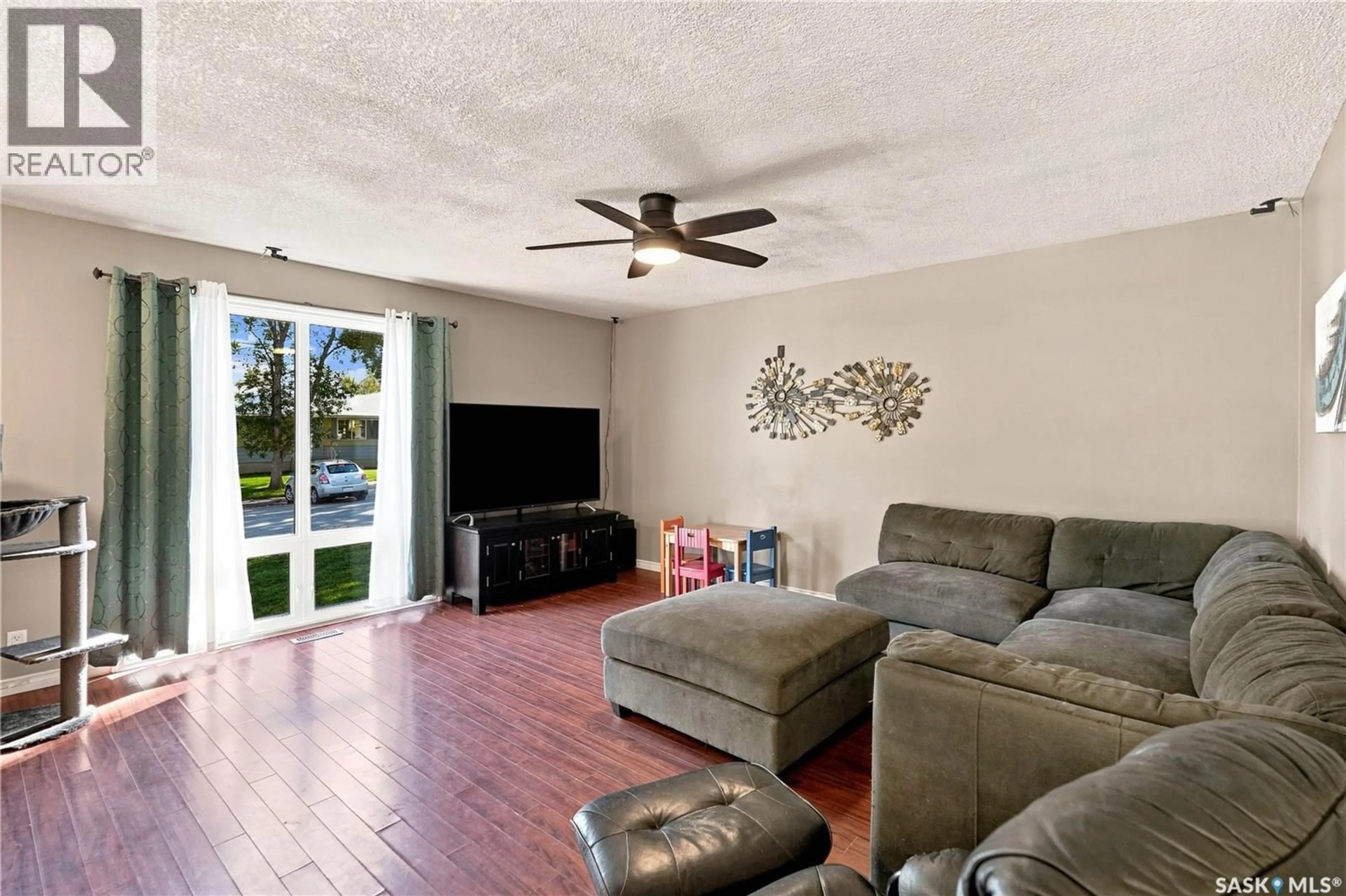 Living room with furniture, unknown for 46 COOPER CRESCENT, Regina Saskatchewan S4R4J7