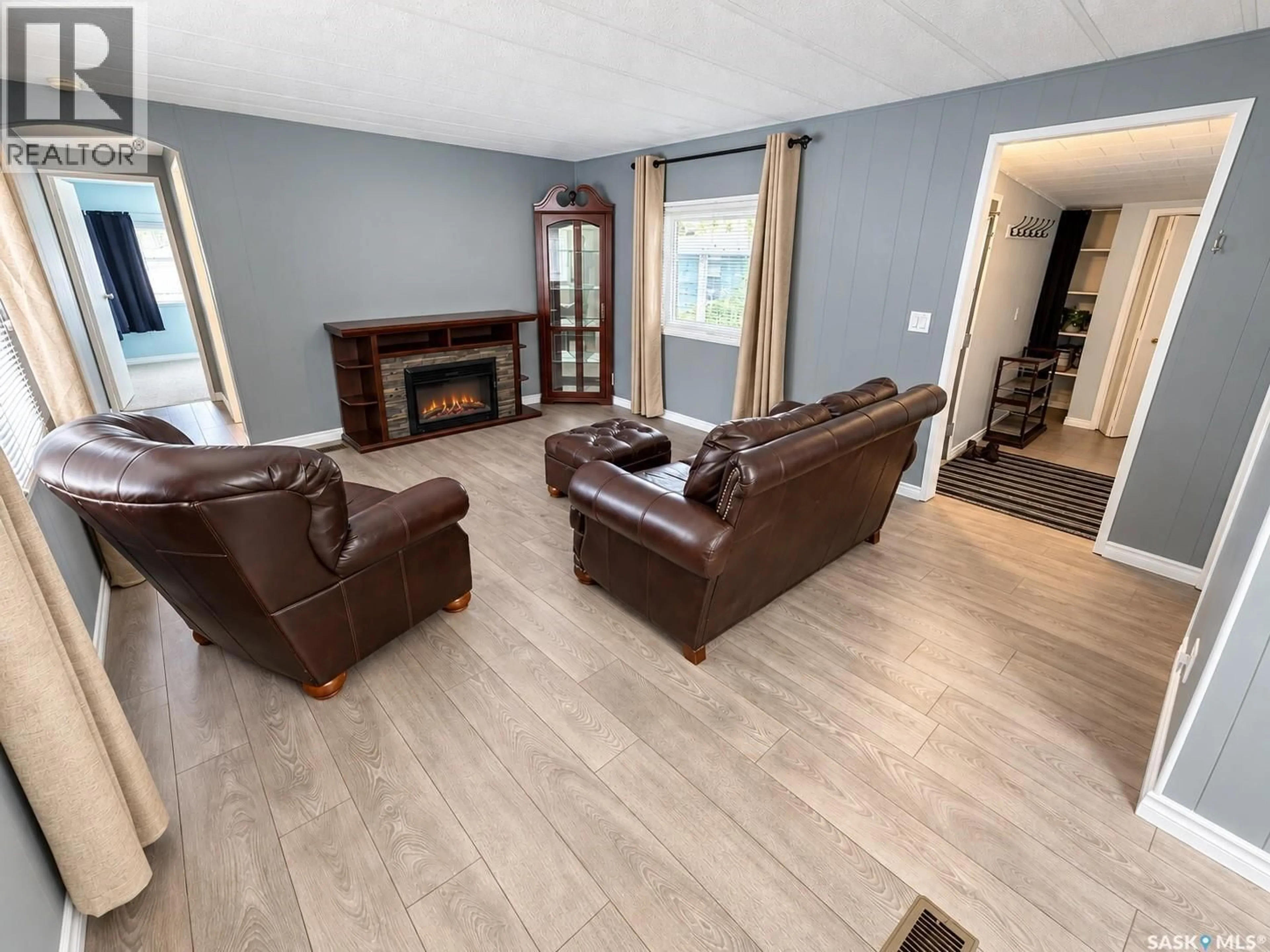 Living room with furniture, unknown for 1746 COTEAU AVENUE, Weyburn Saskatchewan S4H2R7