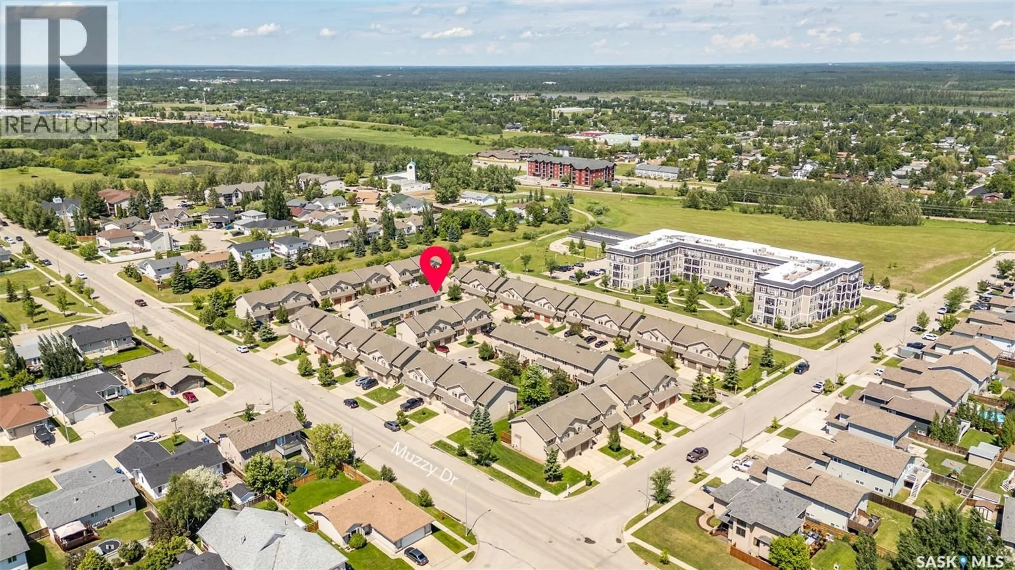 A pic from outside/outdoor area/front of a property/back of a property/a pic from drone, street for 51 1600 MUZZY DRIVE, Prince Albert Saskatchewan S6X0A2