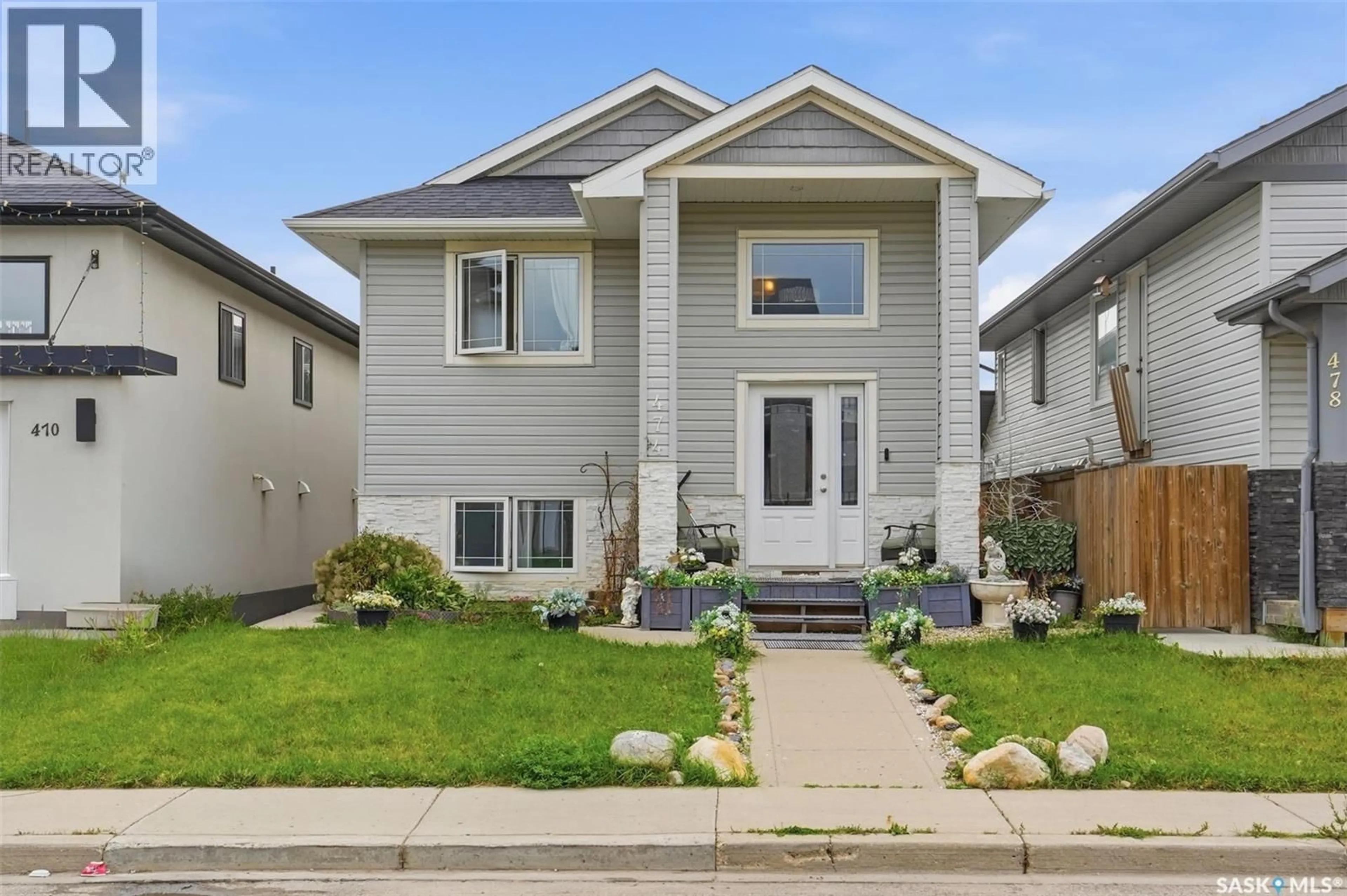 Home with vinyl exterior material, street for 474 KLOPPENBURG STREET, Saskatoon Saskatchewan S7W0N8