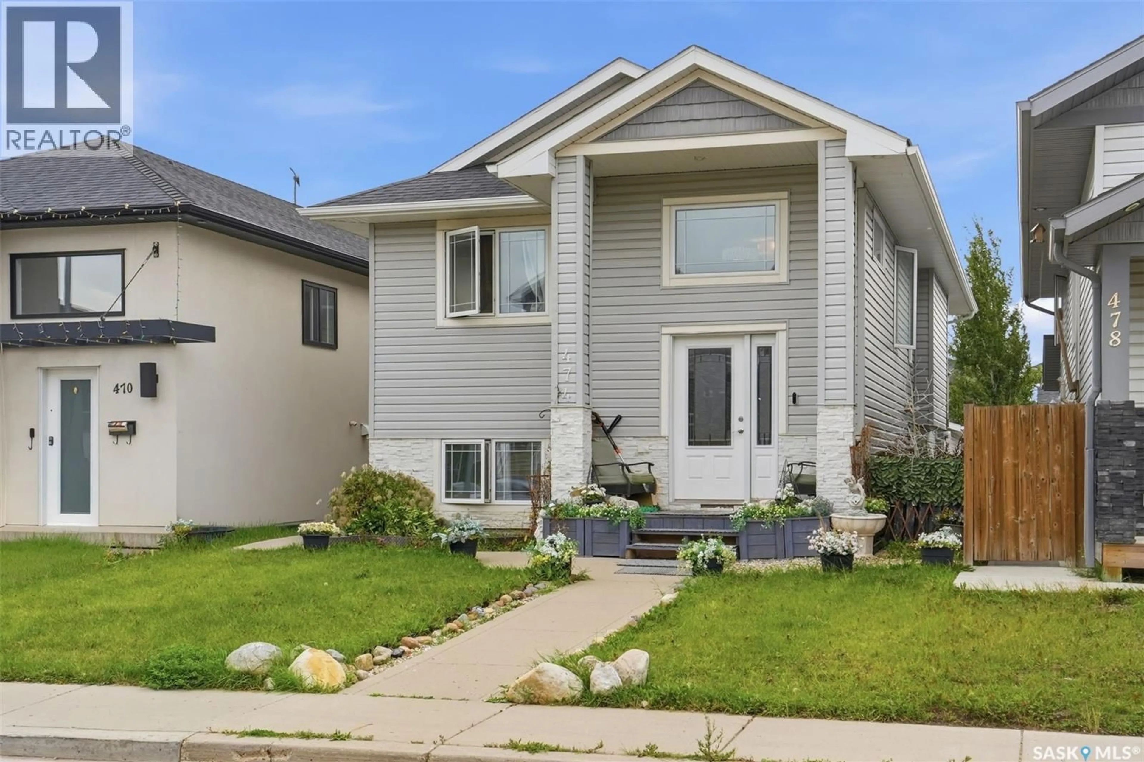 Home with vinyl exterior material, street for 474 KLOPPENBURG STREET, Saskatoon Saskatchewan S7W0N8