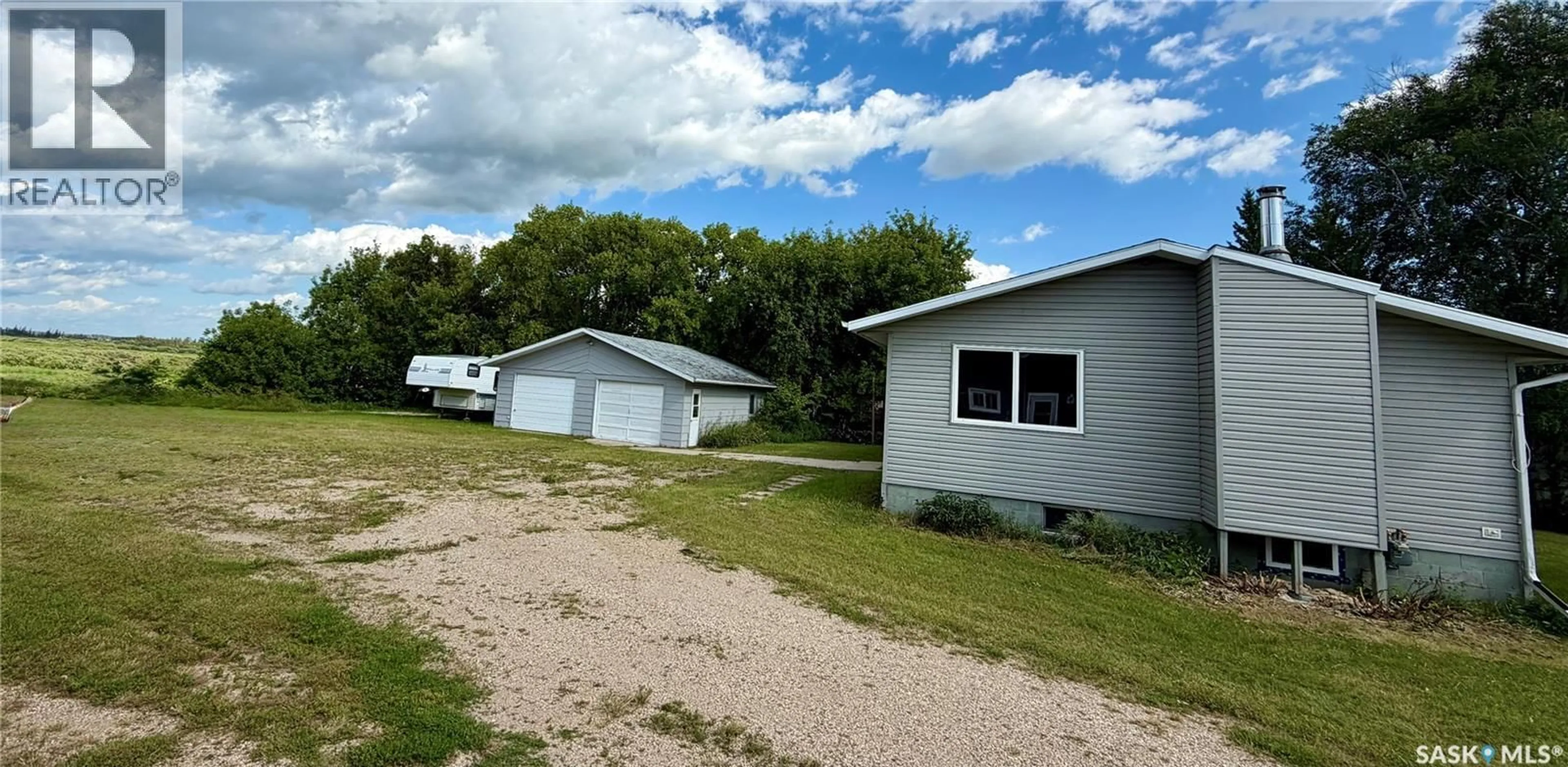 A pic from outside/outdoor area/front of a property/back of a property/a pic from drone, unknown for 203 2ND AVENUE, Stenen Saskatchewan S0A3X0
