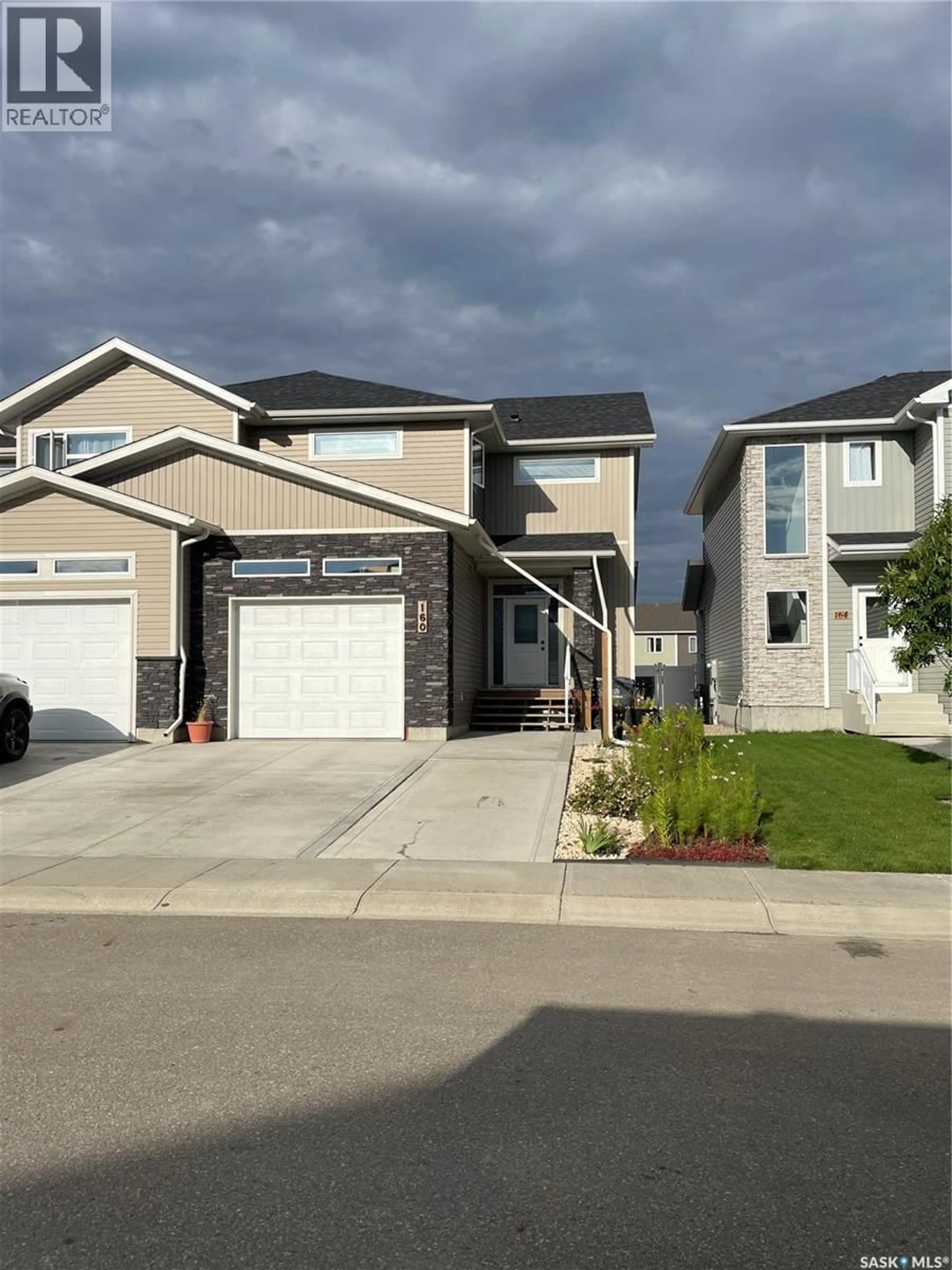 Home with vinyl exterior material, street for 160 ECHO LANE, Martensville Saskatchewan S0K2T1