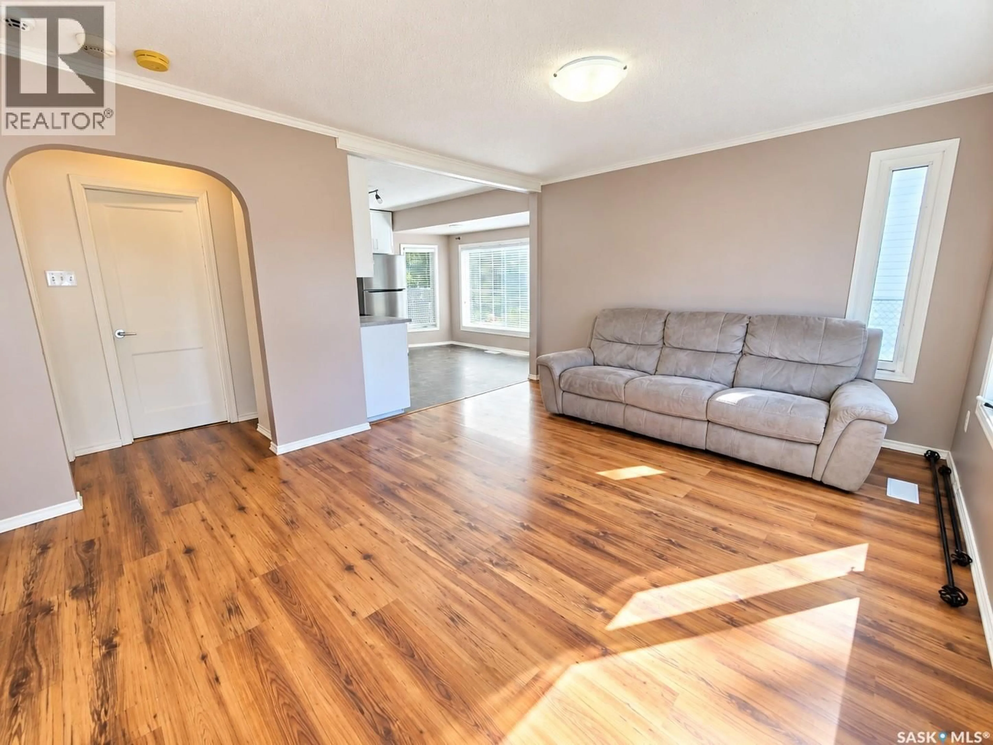 Living room with furniture, wood/laminate floor for 1536 1ST AVENUE, Saskatoon Saskatchewan S7K1Z3