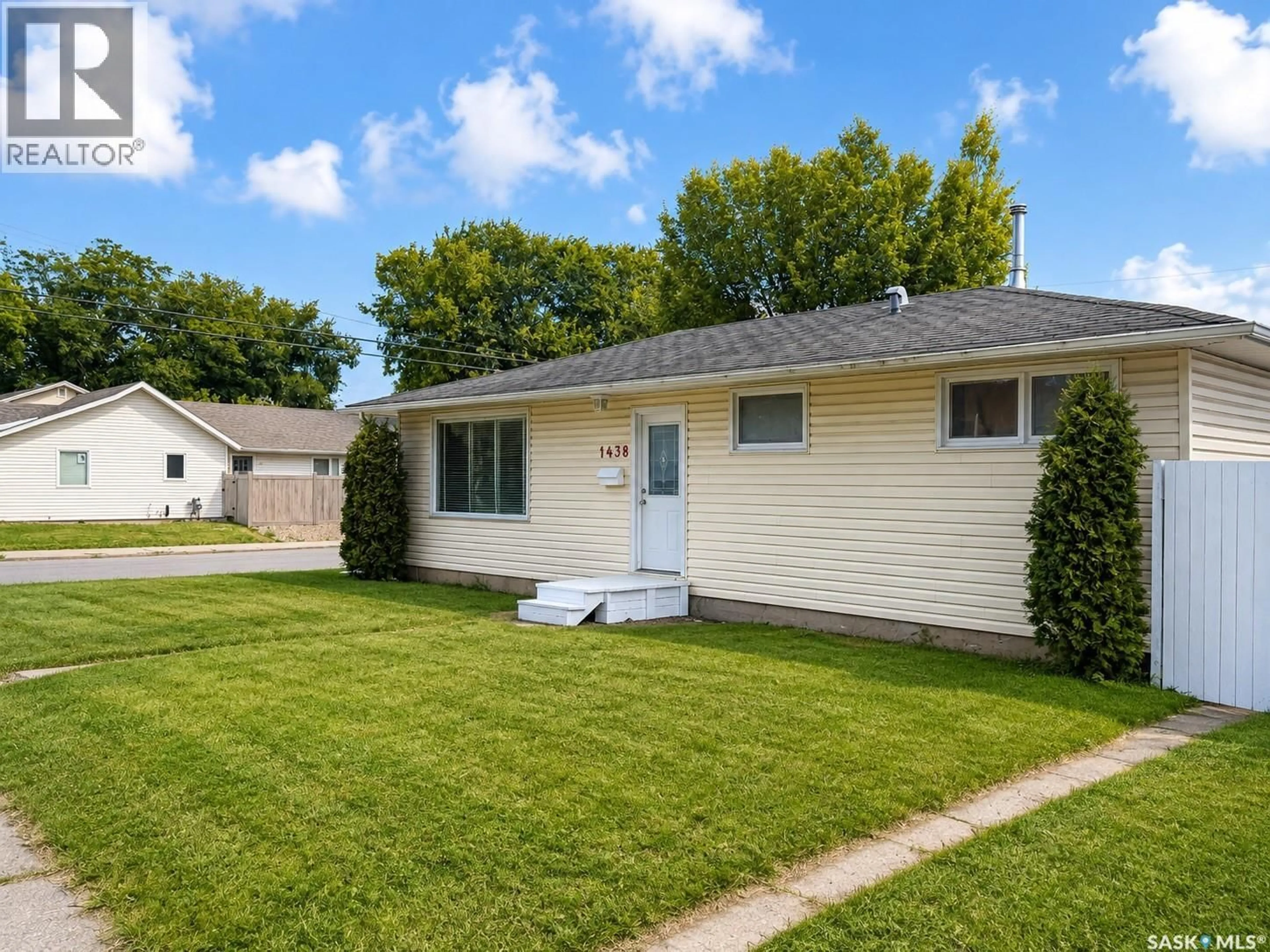 Home with vinyl exterior material, street for 1438 D AVENUE, Saskatoon Saskatchewan S7L1P4