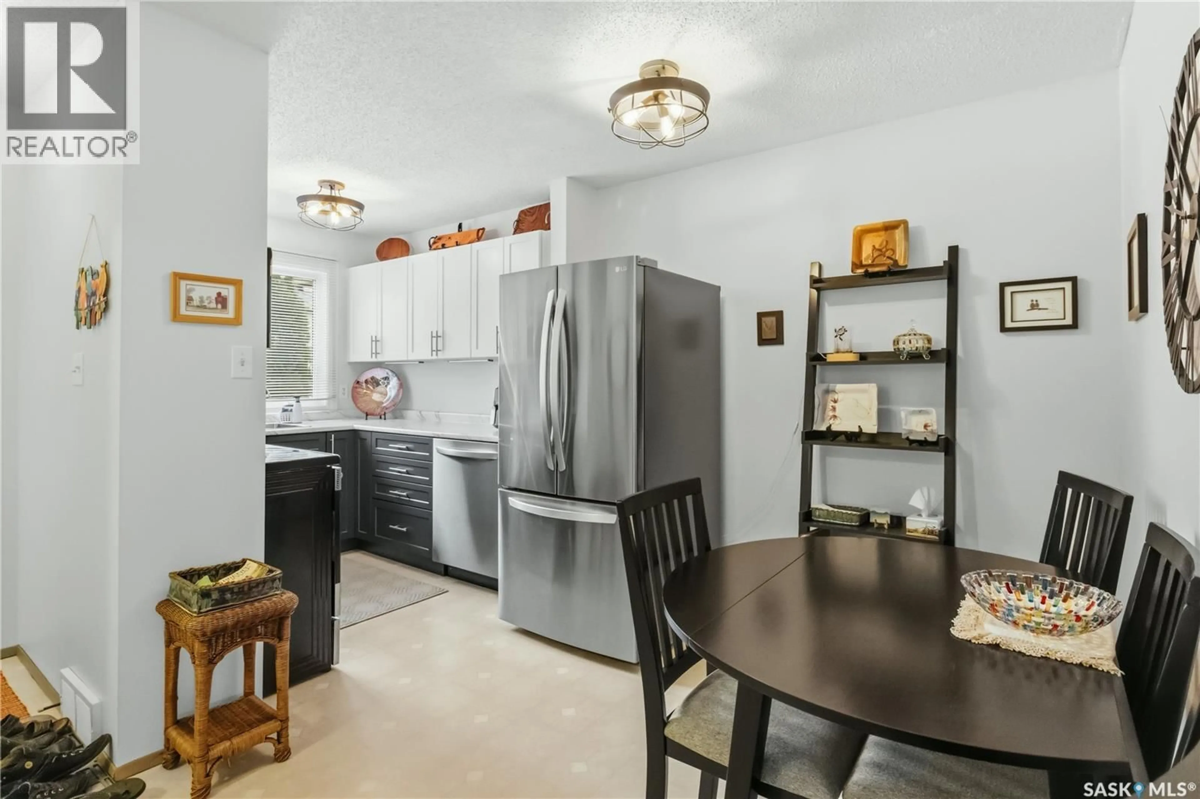 Open concept kitchen, ceramic/tile floor for 1128 - 30 MCKERCHER DRIVE, Saskatoon Saskatchewan S7H4Y7