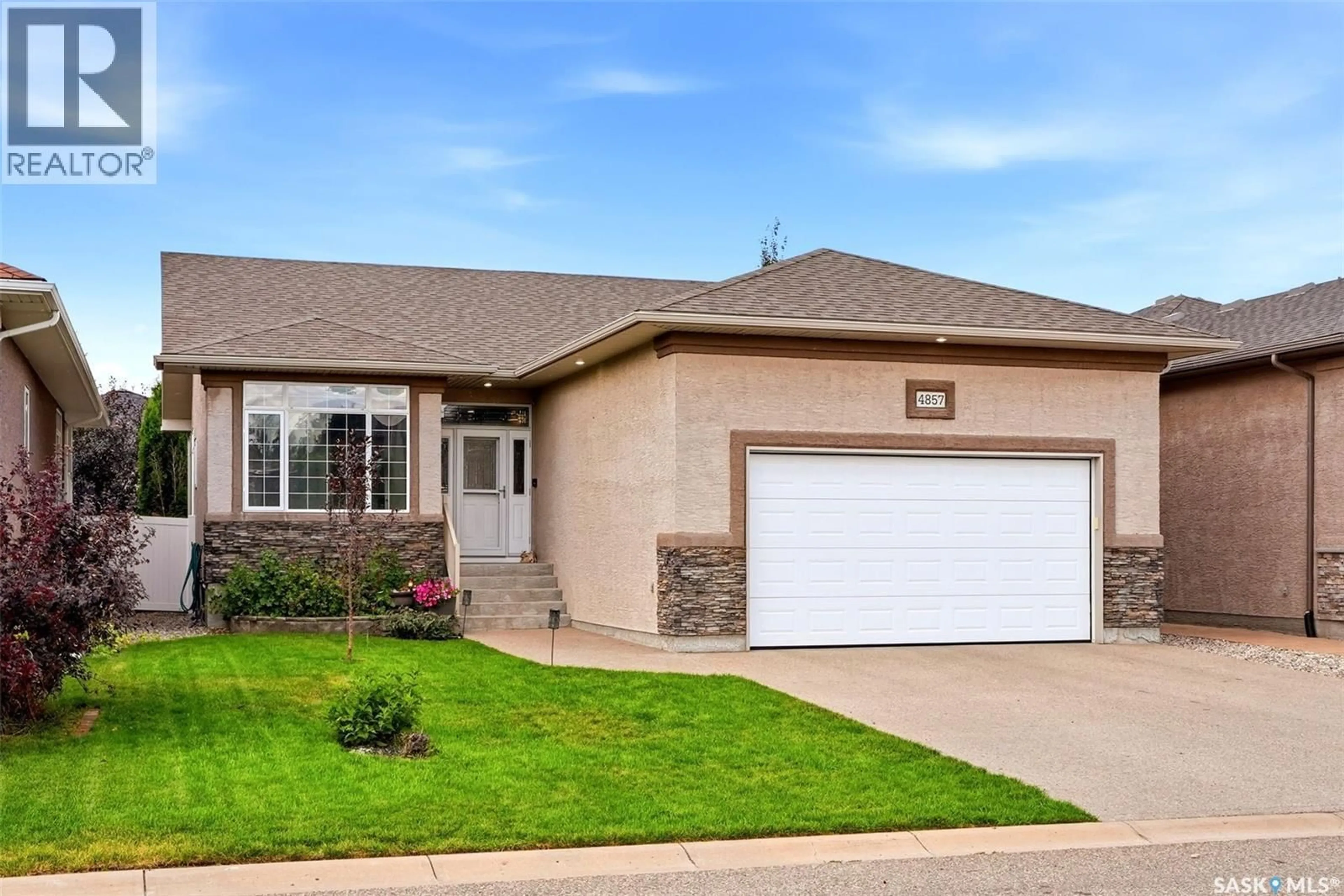 Home with brick exterior material, street for 4857 MCCOMBIE CRESCENT, Regina Saskatchewan S4W0B2