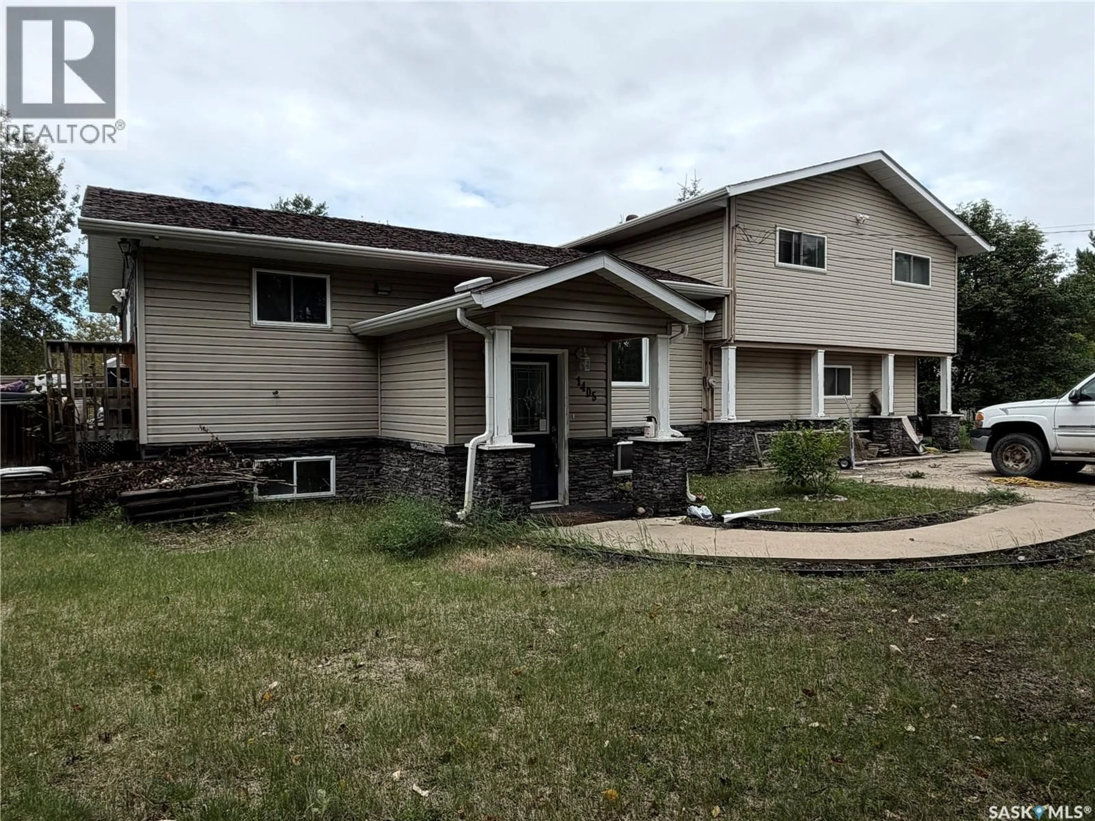 Home with vinyl exterior material, building for 1405 4TH AVENUE, Prince Albert Saskatchewan S6V5R3