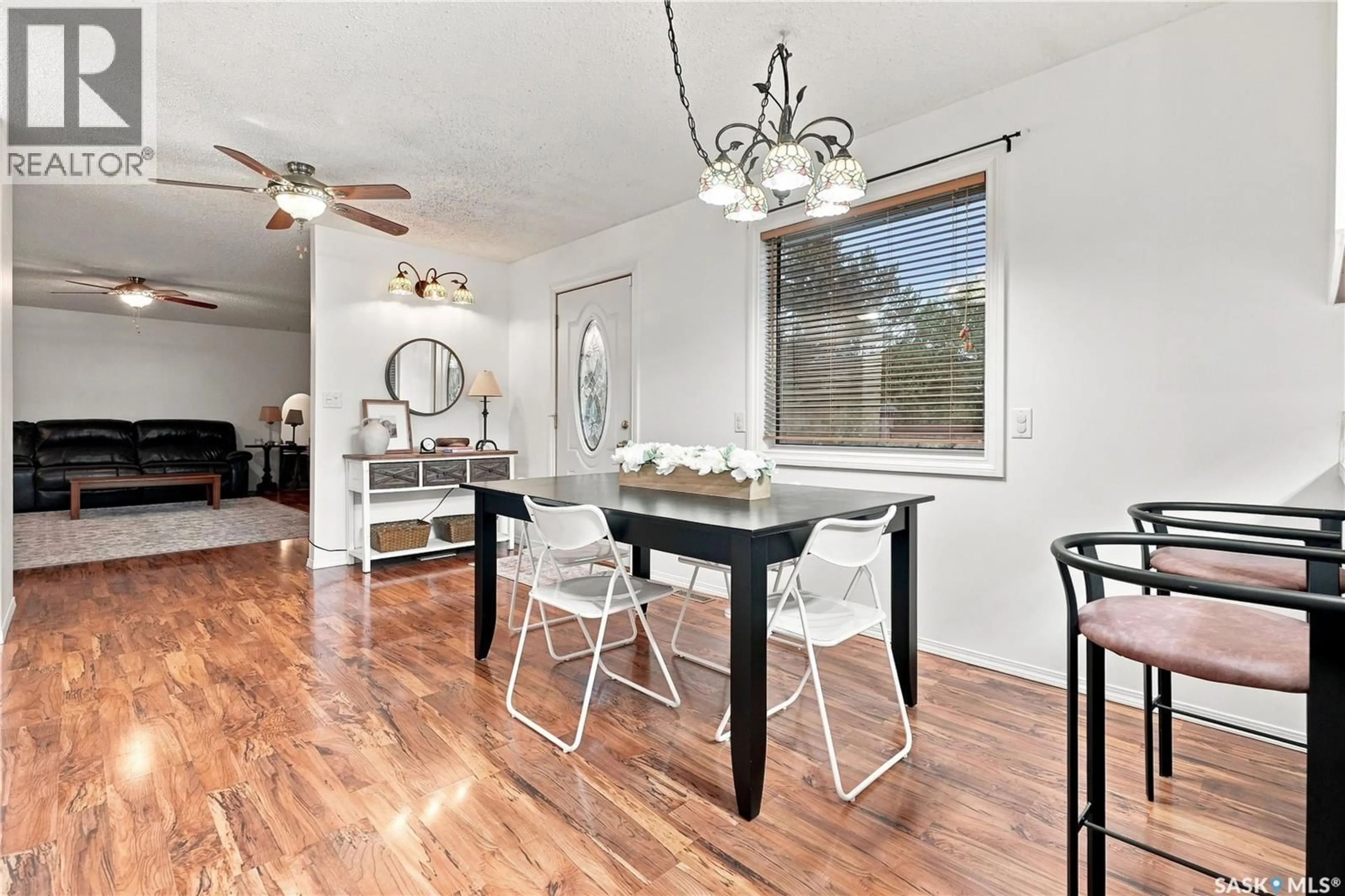 Dining room, wood/laminate floor for 102 CAMPKIN STREET, Francis Saskatchewan S0G1V0