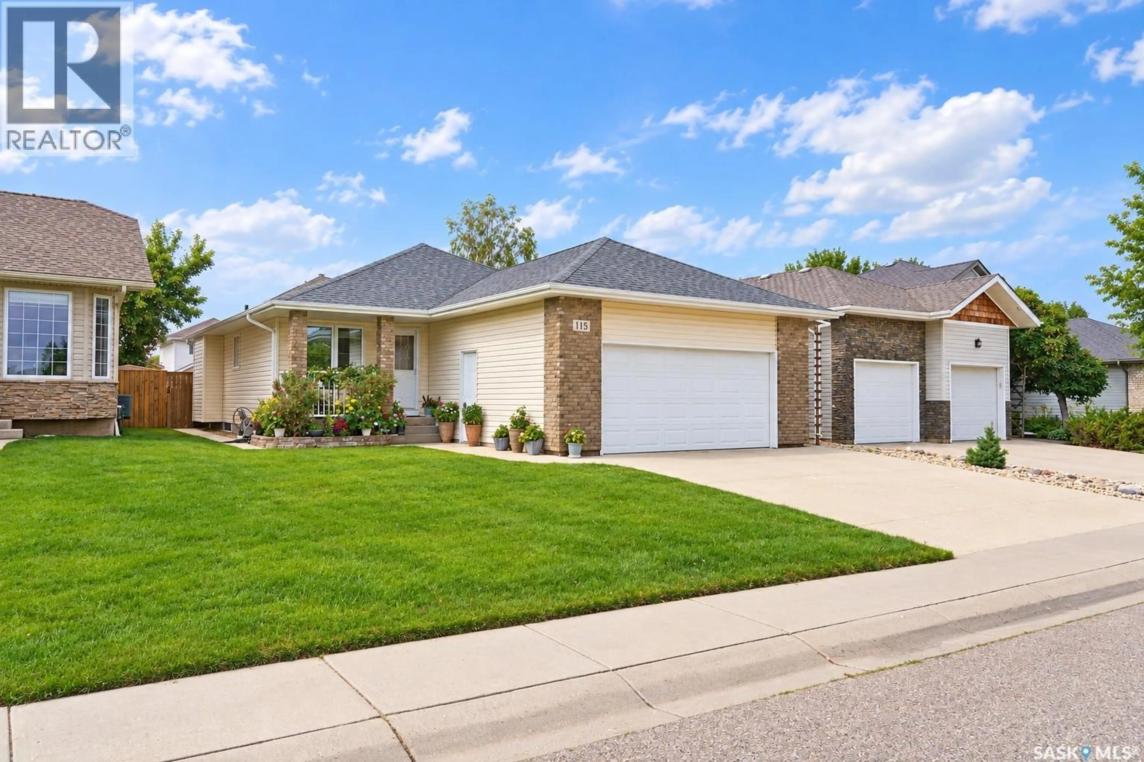 Home with brick exterior material, street for 115 MARTIN CRESCENT, Saskatoon Saskatchewan S7T0A1