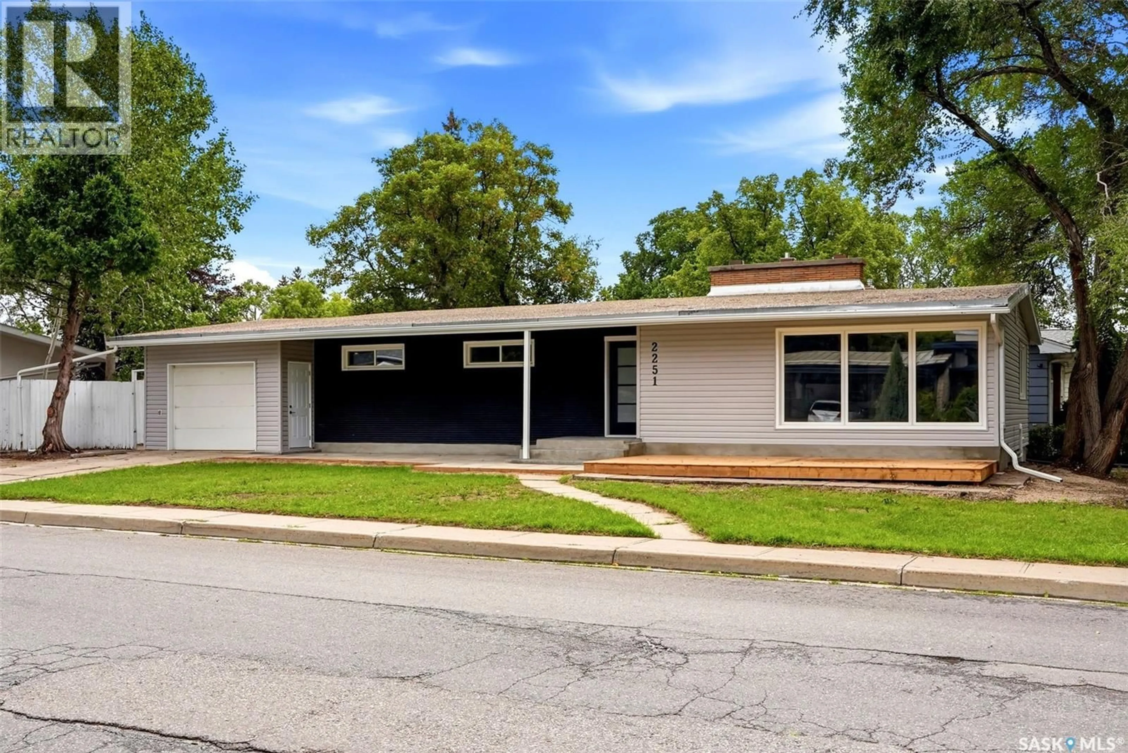 Home with vinyl exterior material, street for 2251 JUBILEE AVENUE, Regina Saskatchewan S4S3V3