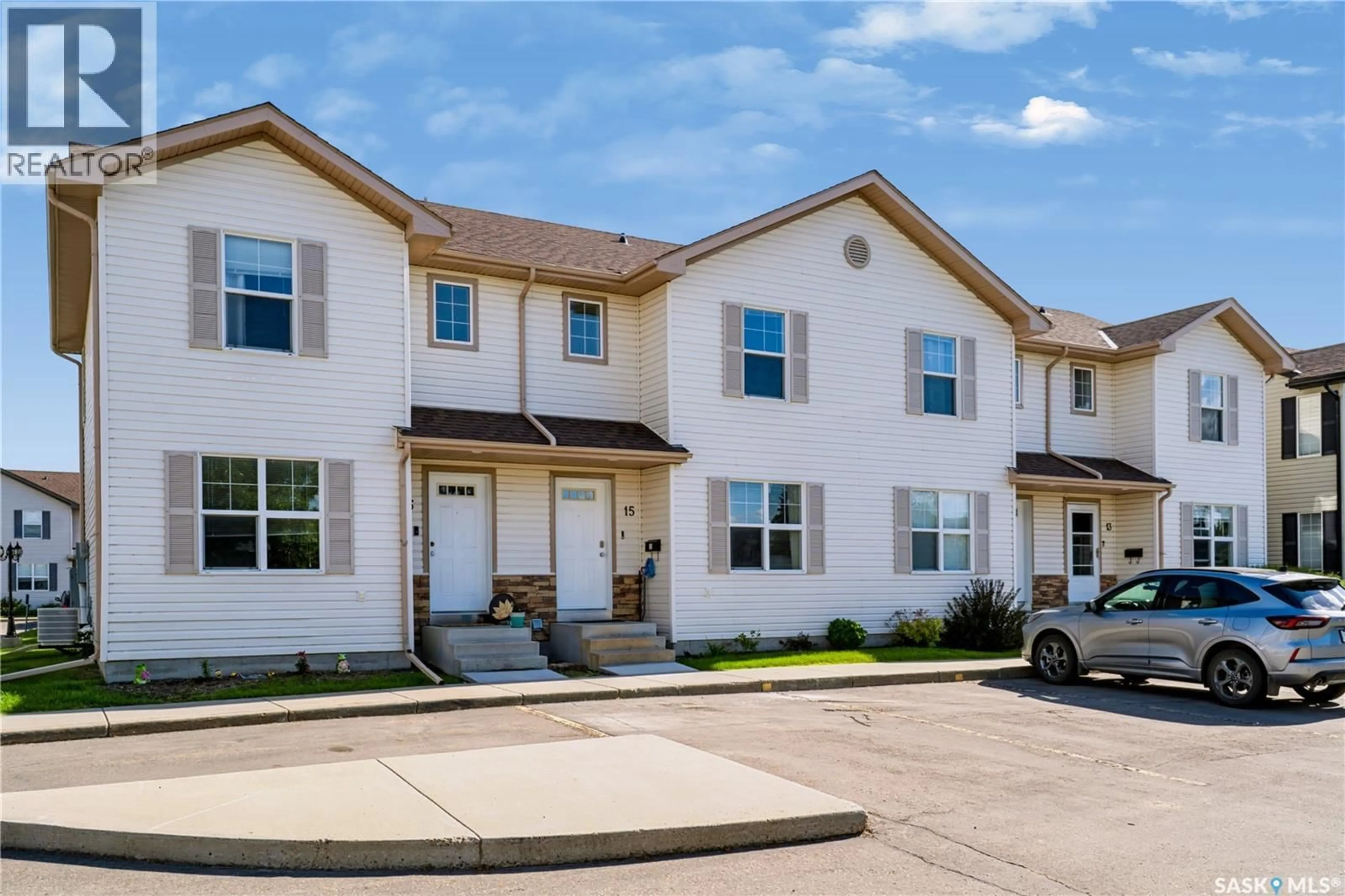 Home with vinyl exterior material, street for 135 - 15 PAWLYCHENKO LANE, Saskatoon Saskatchewan S7V1J8